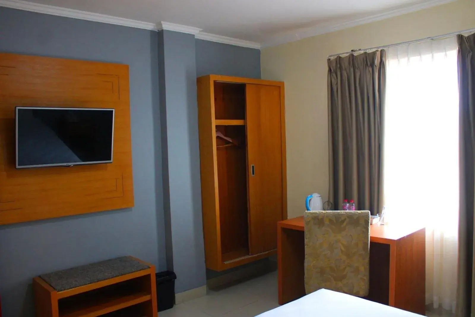 Bed in Maleosan Inn Manado Hotel Bed in Maleosan Inn Manado Hotel