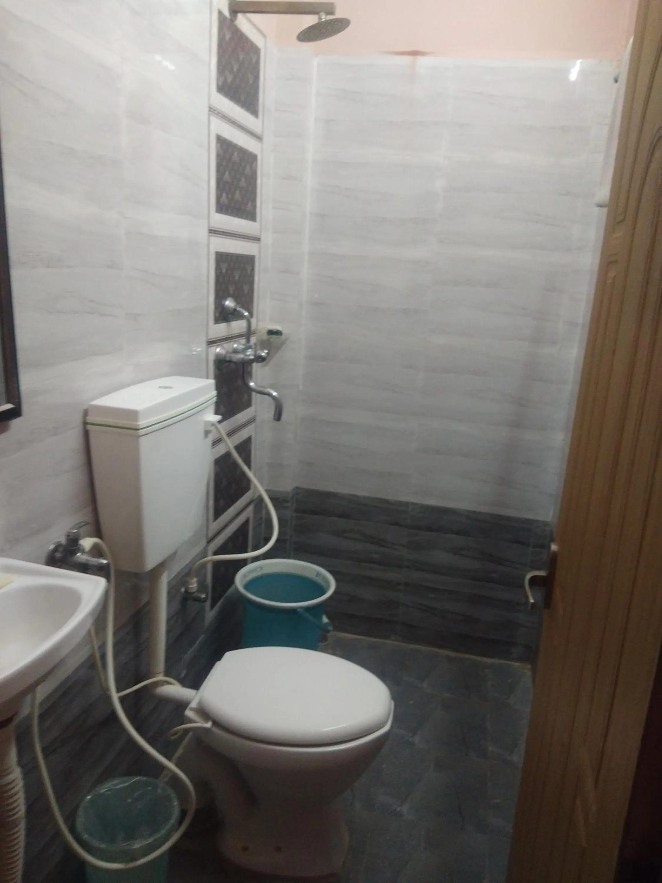 Bathroom in DS Residency Varanasi-Near Temple n Ghat-Parking