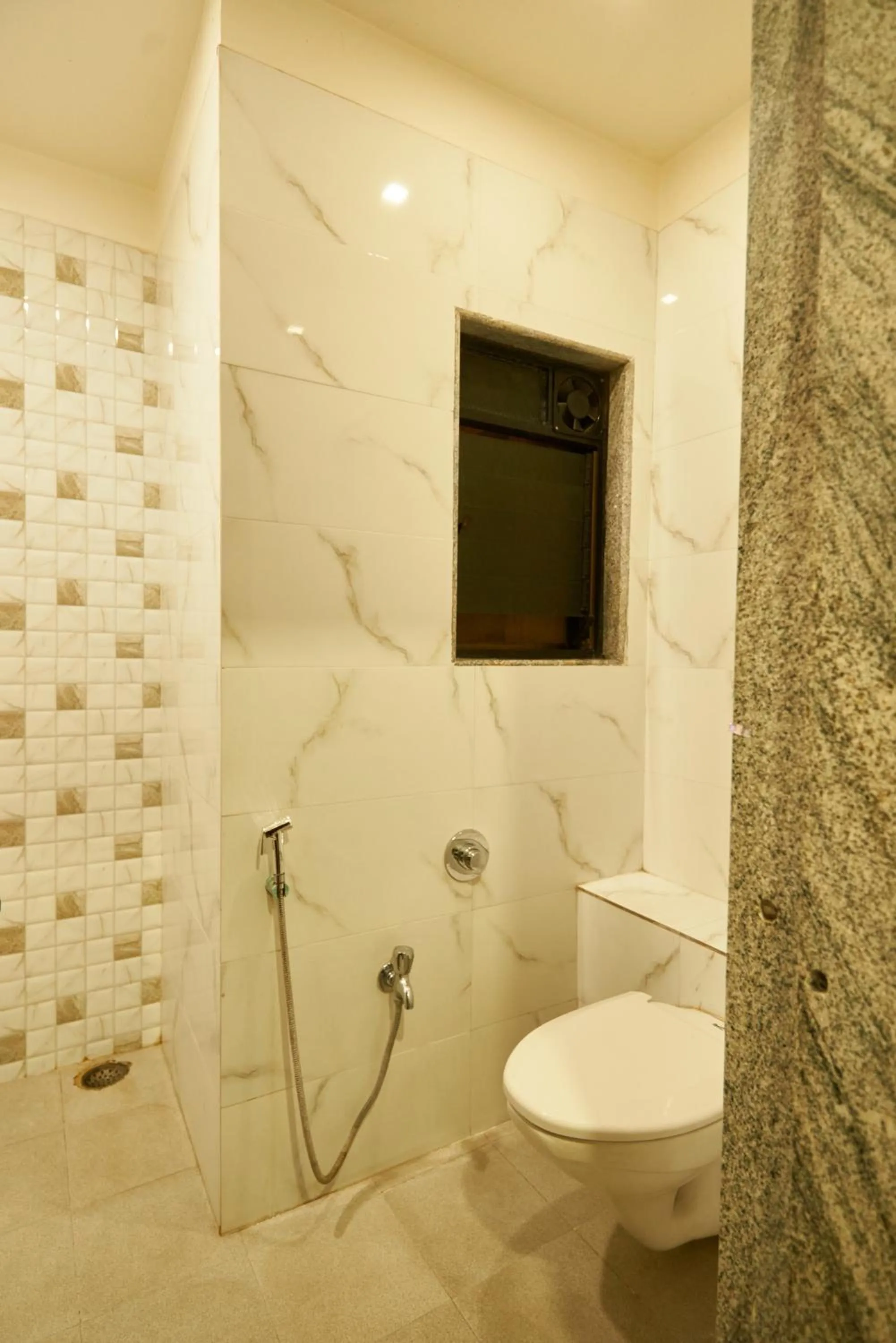 Toilet in Hotel Pride Inn Shirdi