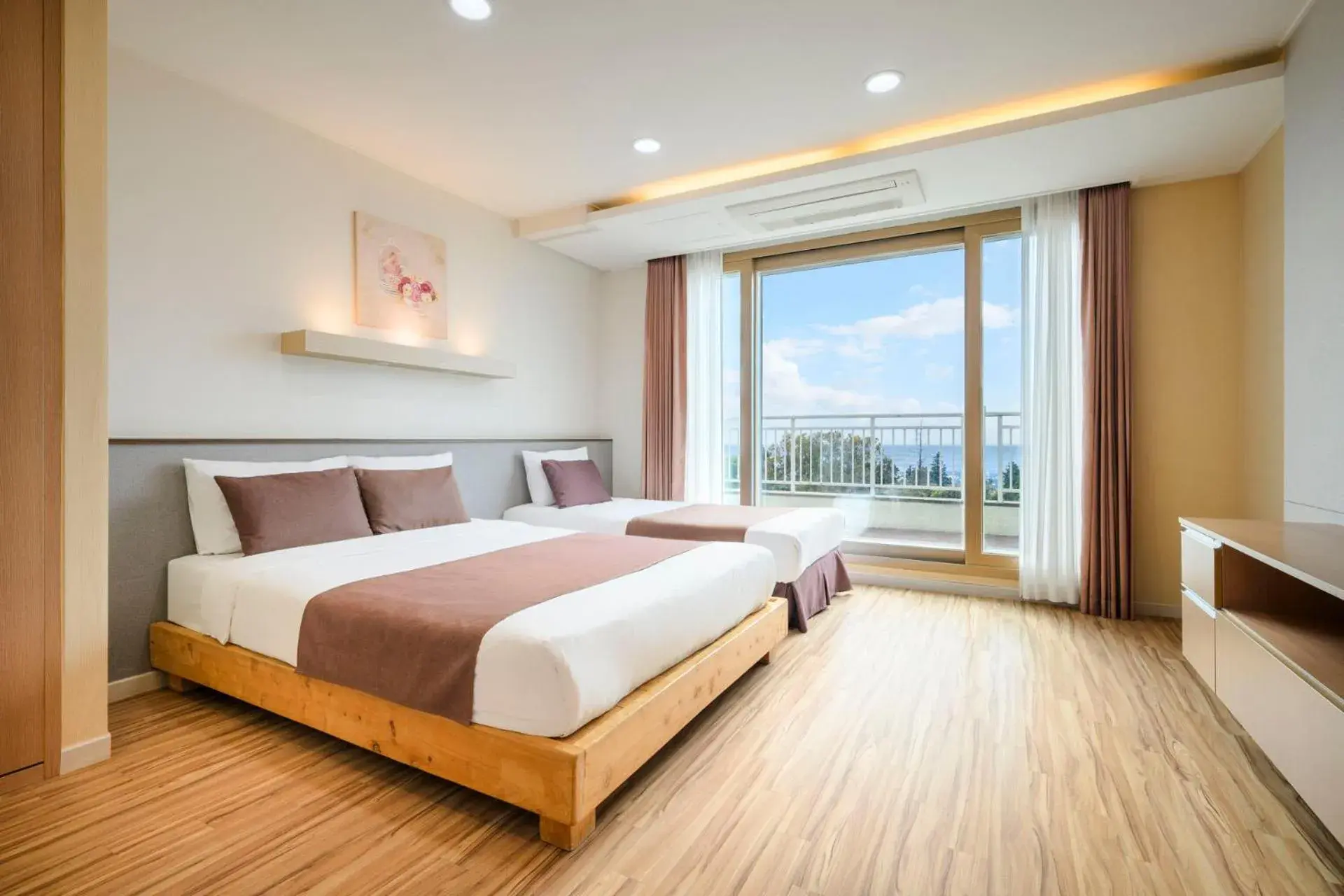 Photo of the whole room, Bed in Jeju M Resort Photo of the whole room, Bed in Jeju M Resort