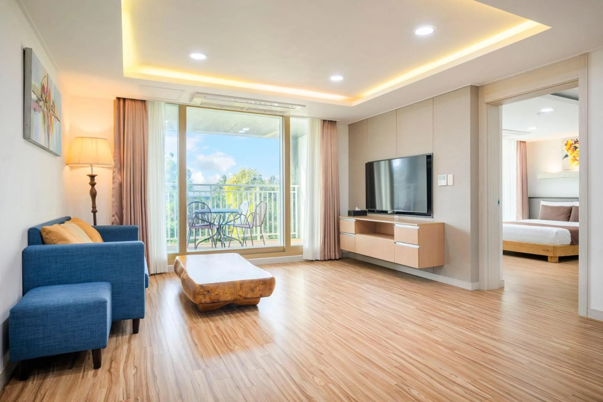 Living room, Bed in Jeju M Resort