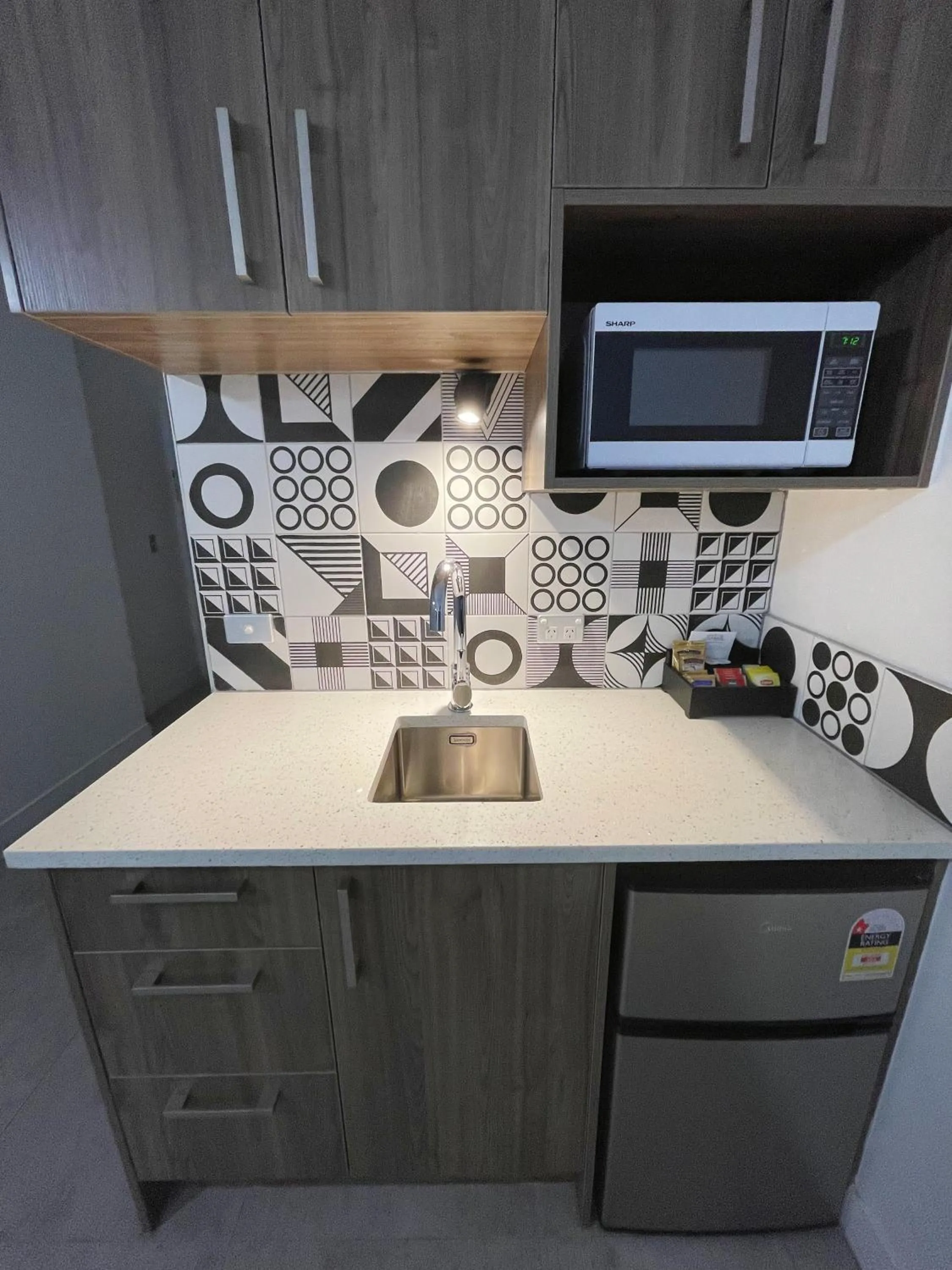 Kitchen or kitchenette in Grand Central Serviced Apartments