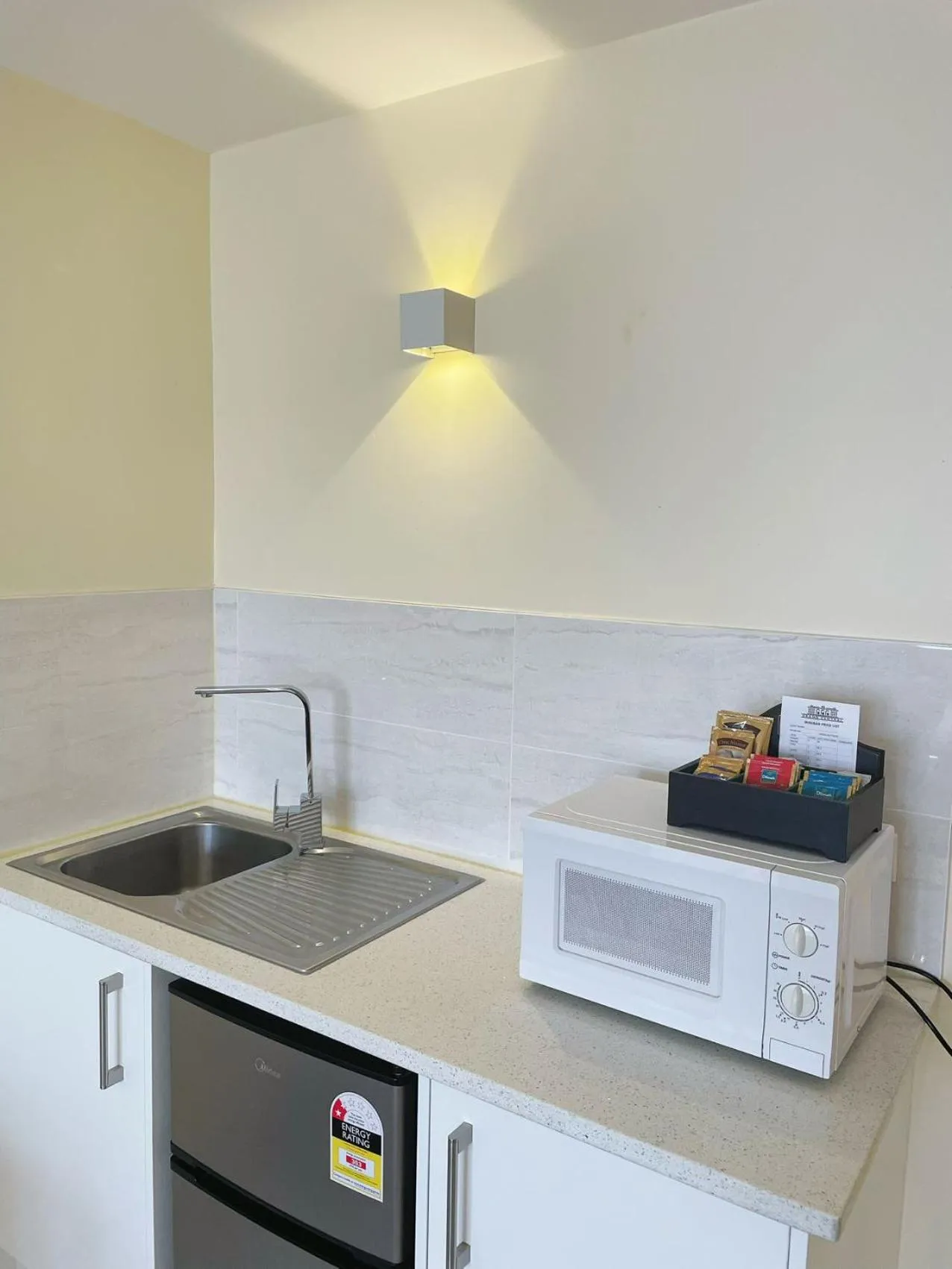 Kitchen or kitchenette in Grand Central Serviced Apartments