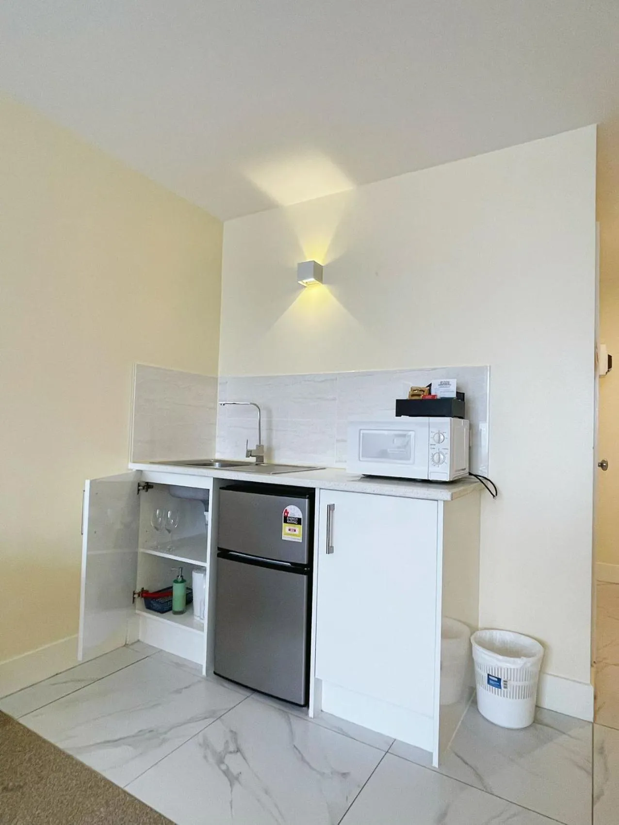 Kitchen or kitchenette in Grand Central Serviced Apartments