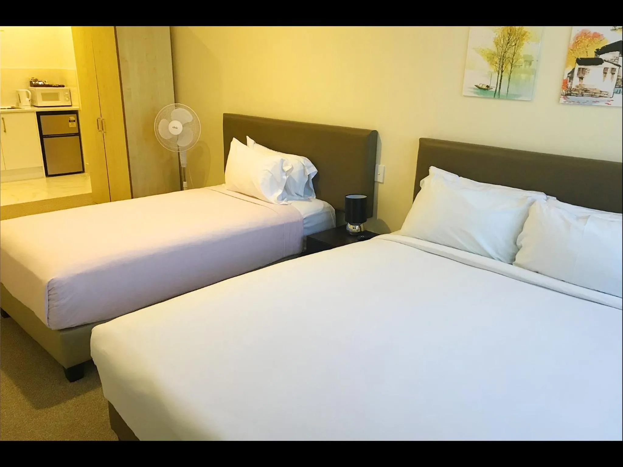 Bed in Grand Central Serviced Apartments