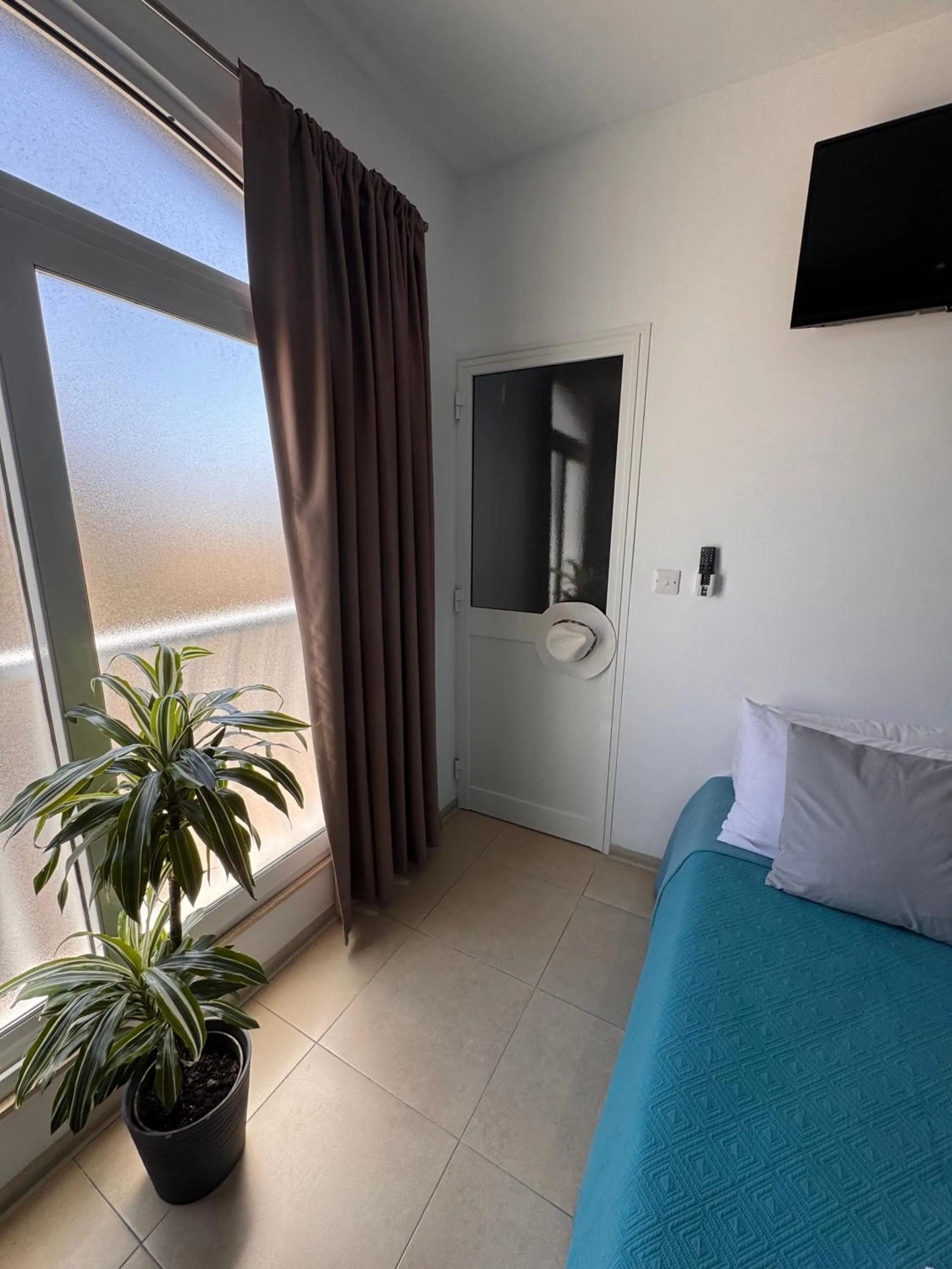 Bed in Allegro Hotel