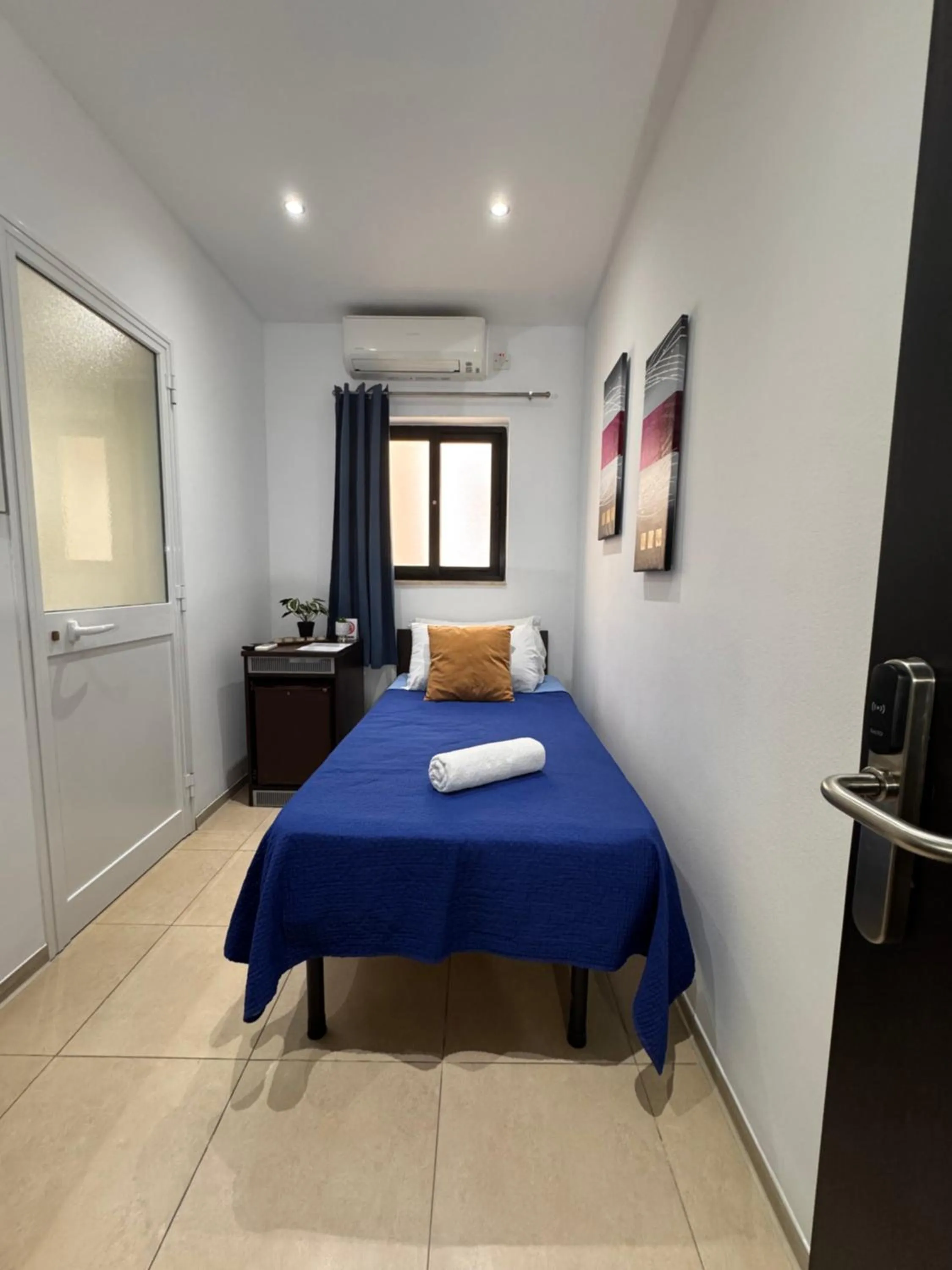 Bed in Allegro Hotel