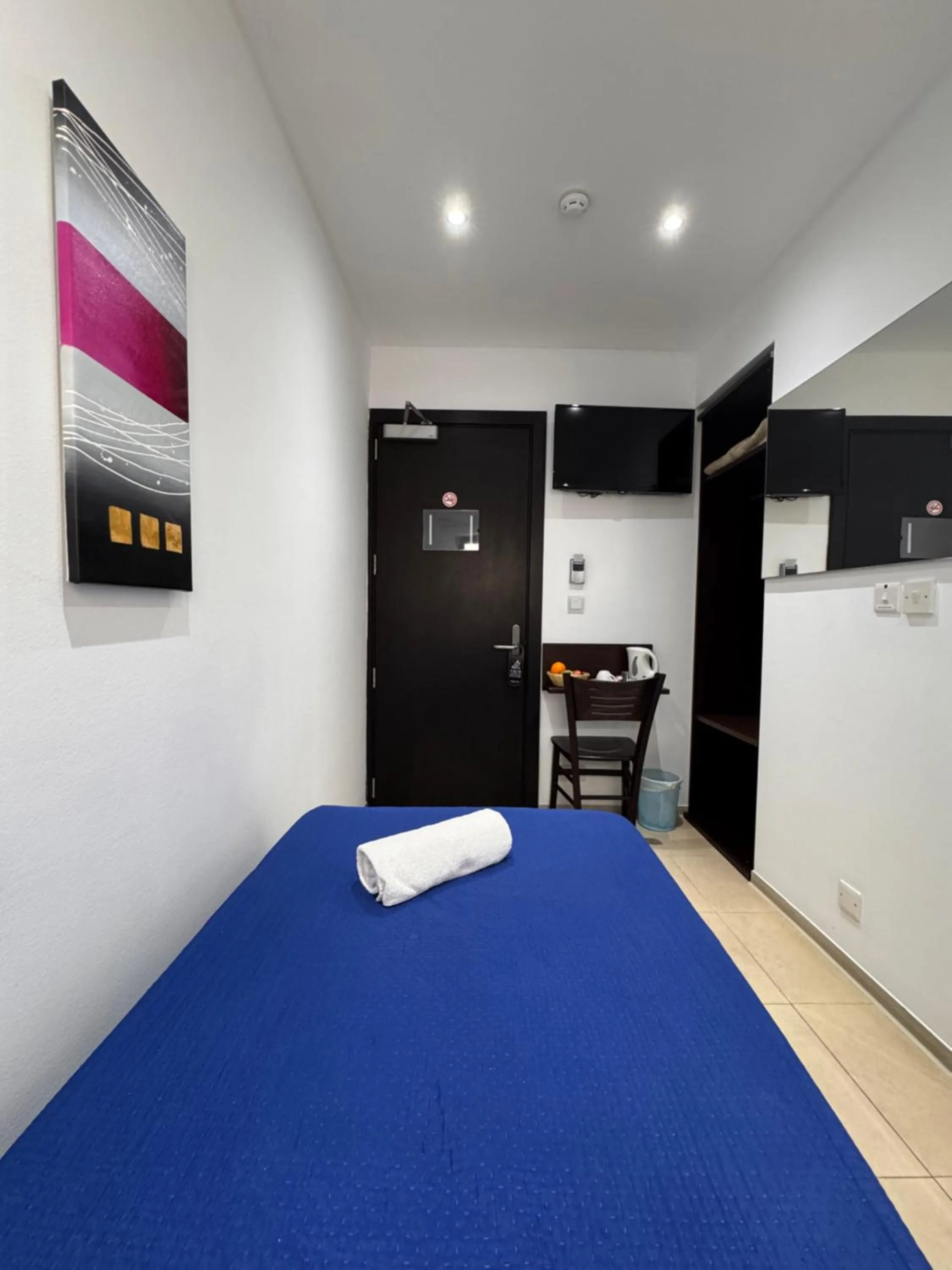 Bed in Allegro Hotel