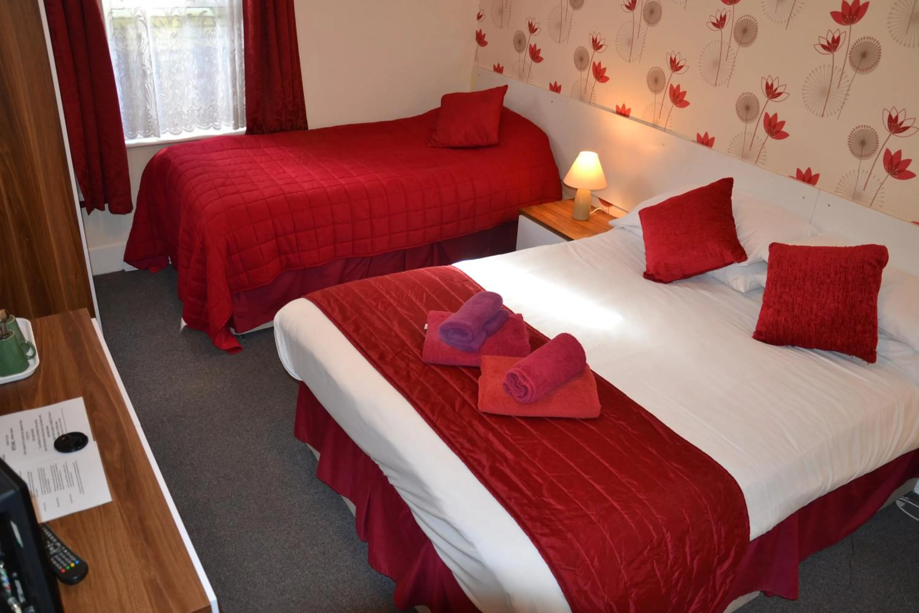 Bed in Abbey Lodge Hotel