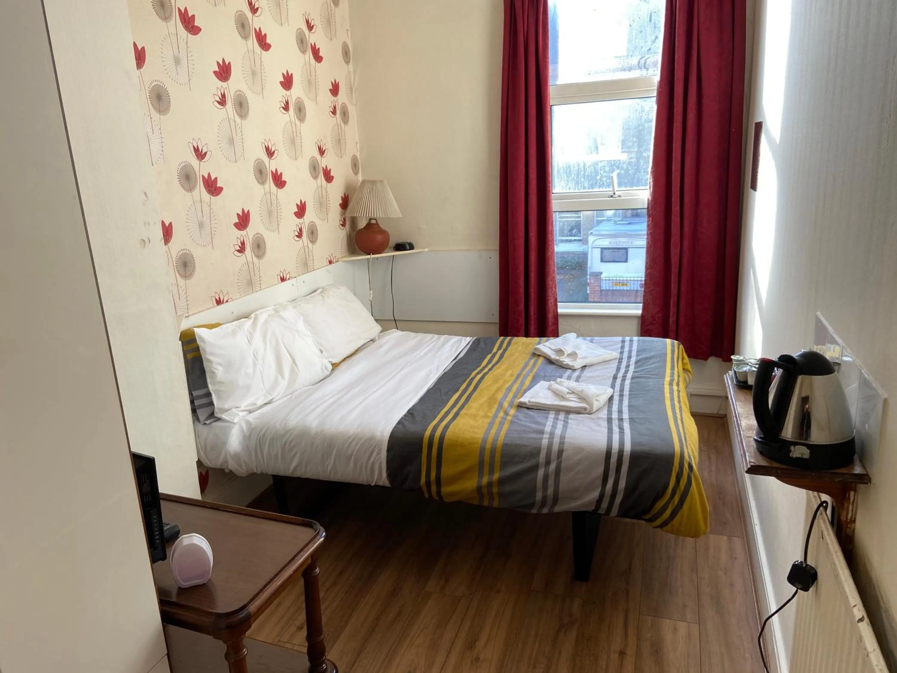 Bed in Abbey Lodge Hotel