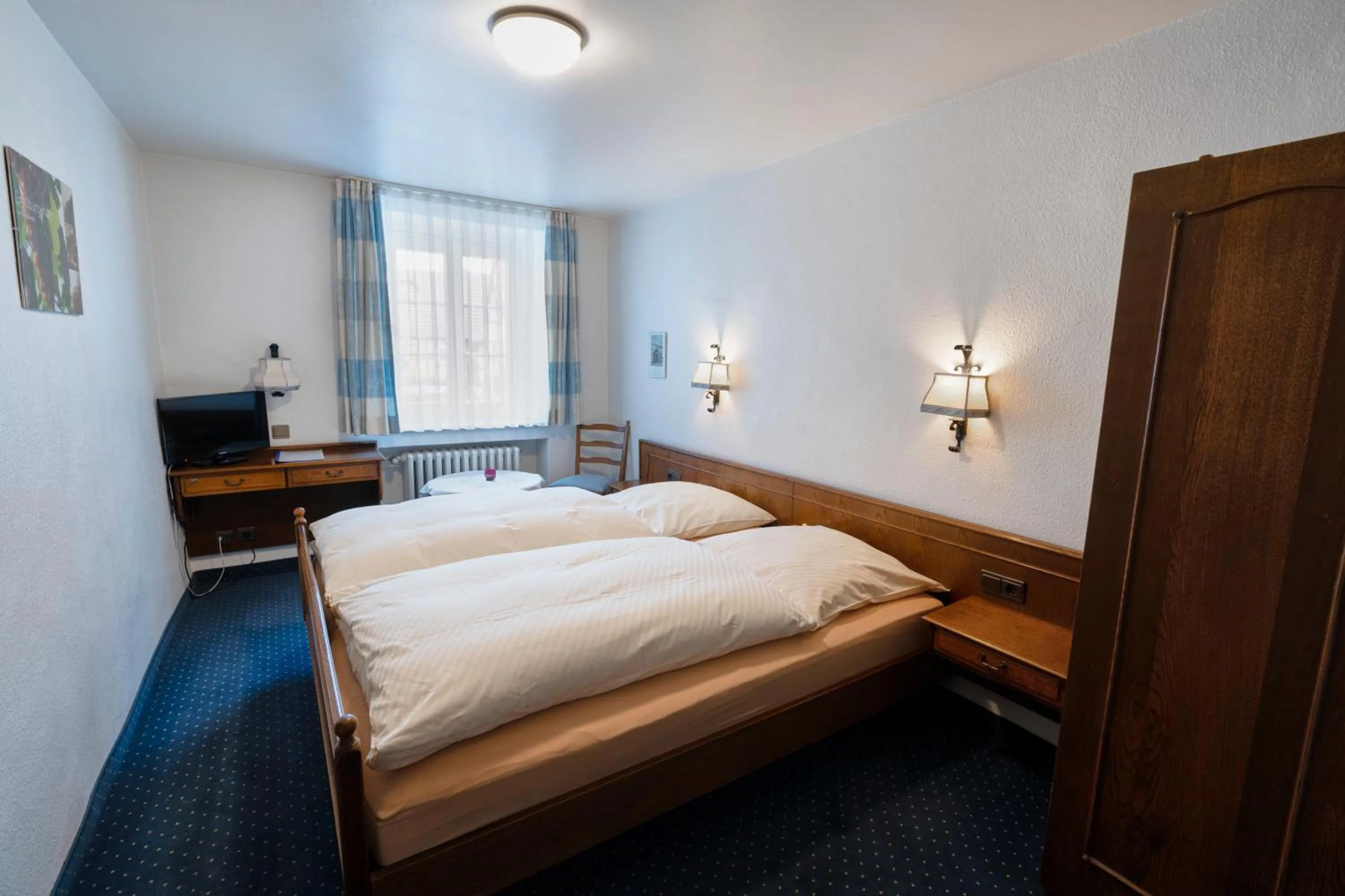 Photo of the whole room, Bed in Gästehaus Korf