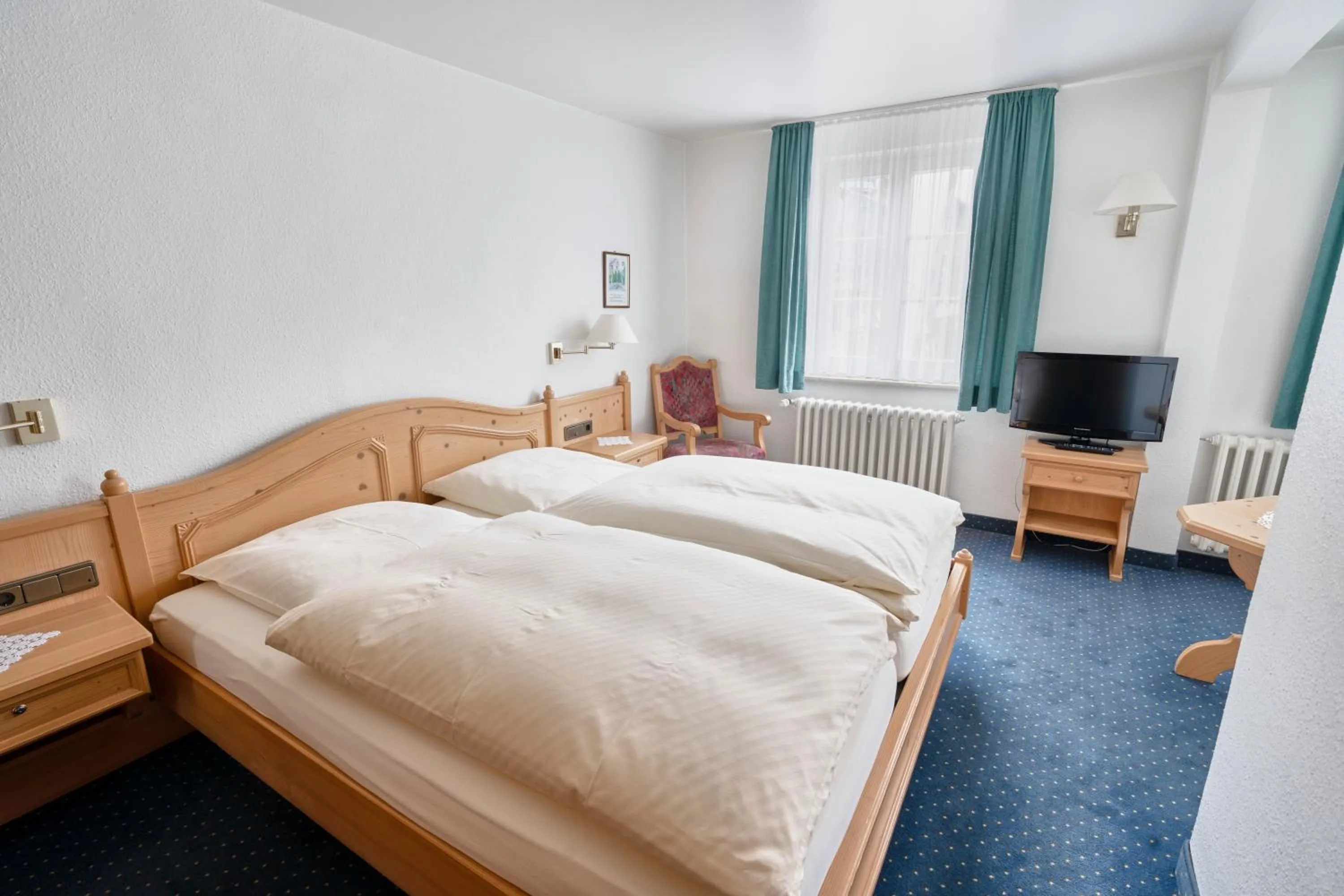 Photo of the whole room, Bed in Gästehaus Korf