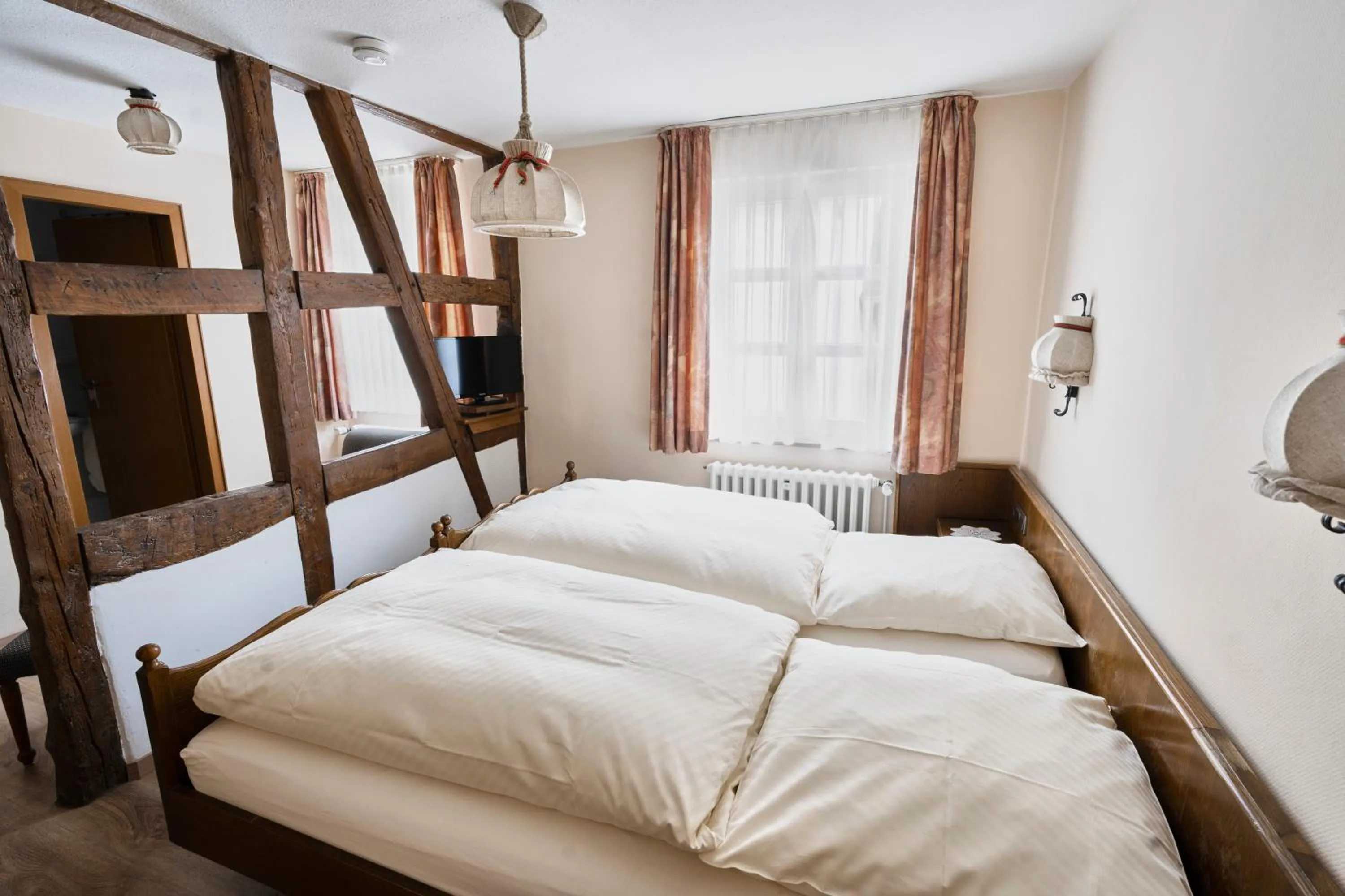 Photo of the whole room, Bed in Gästehaus Korf