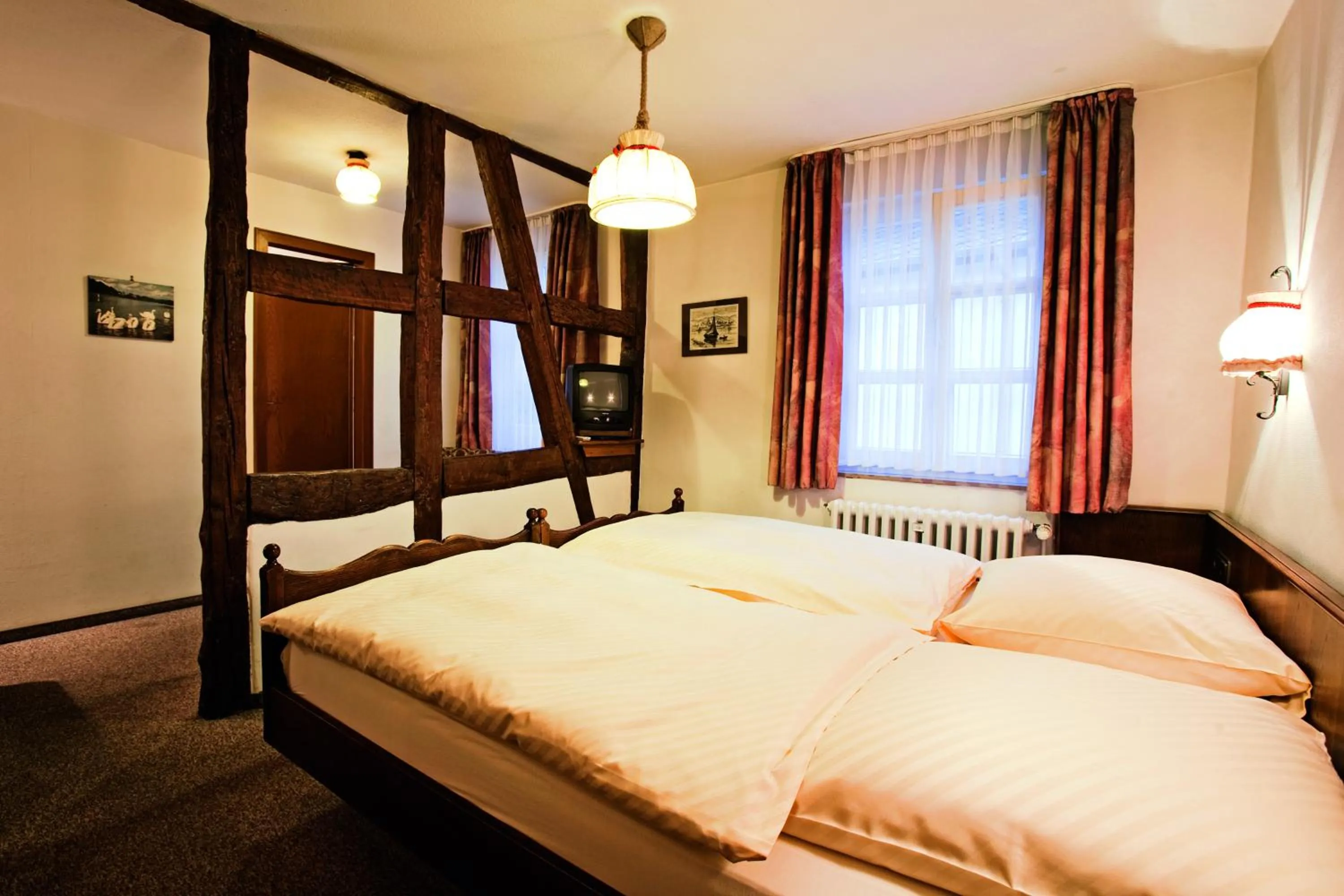 Photo of the whole room, Bed in Gästehaus Korf