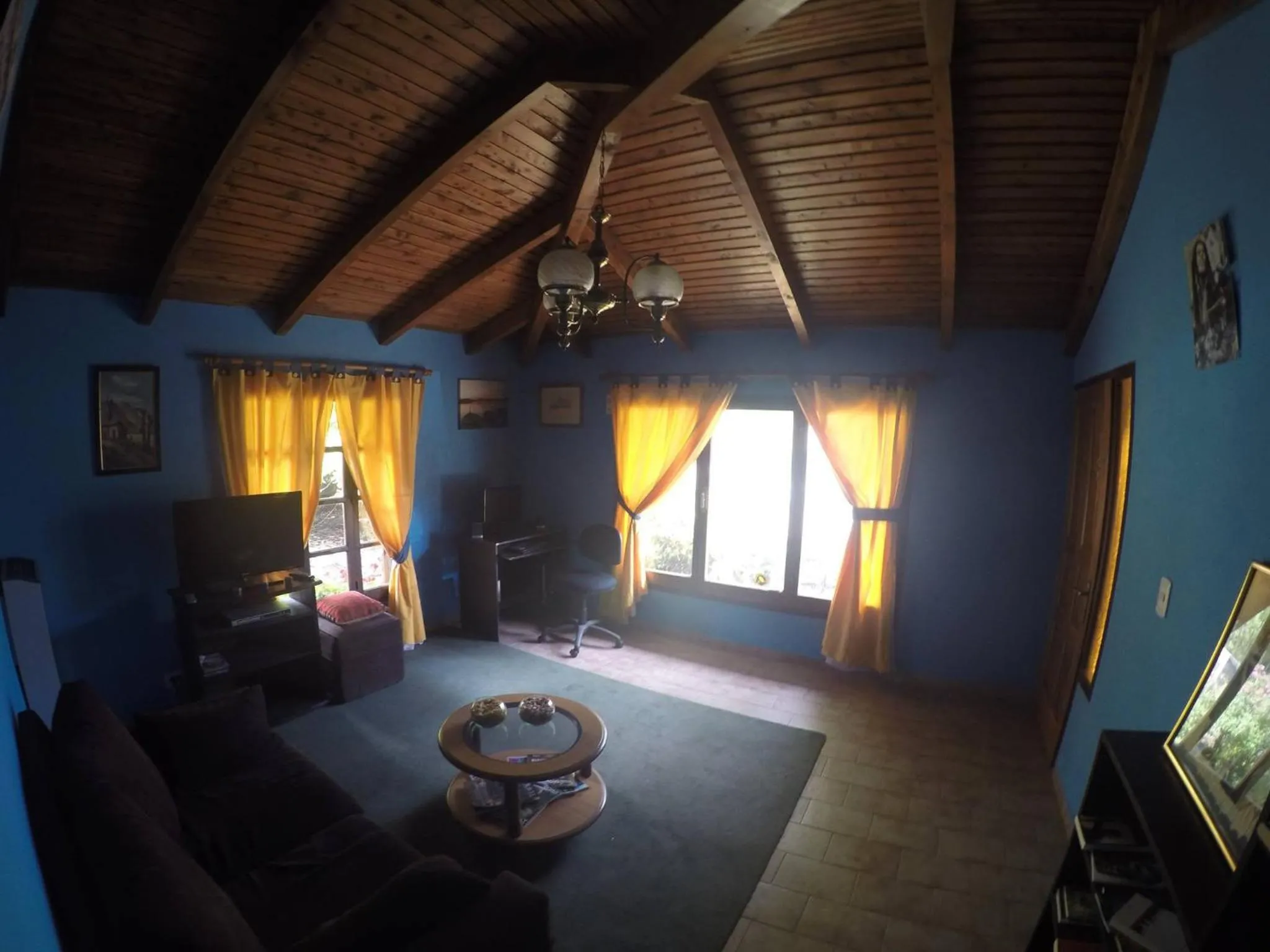 Communal lounge/ TV room in La Estacion Hostel