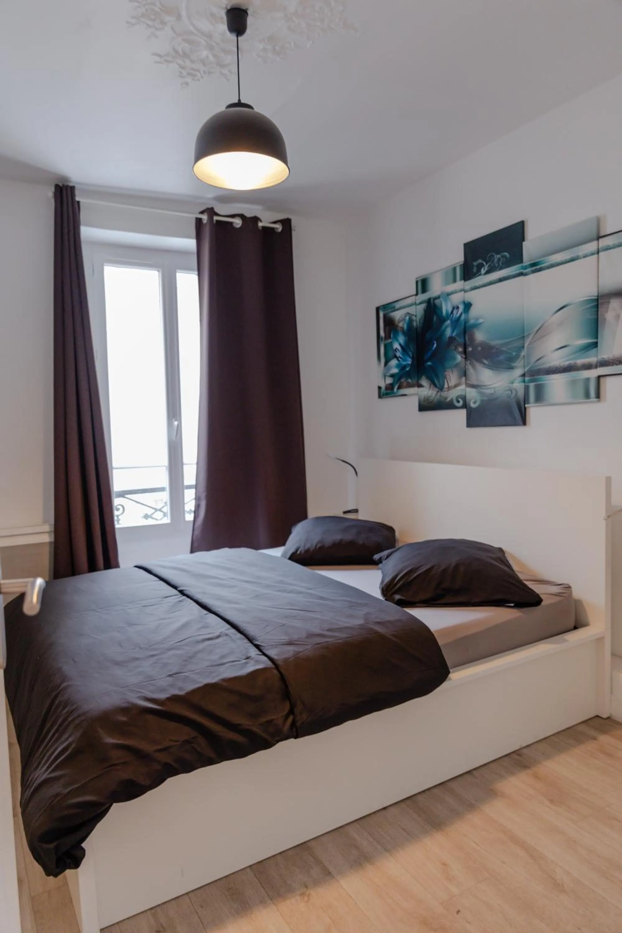 Bed in Meublés de Tourisme à Vincennes