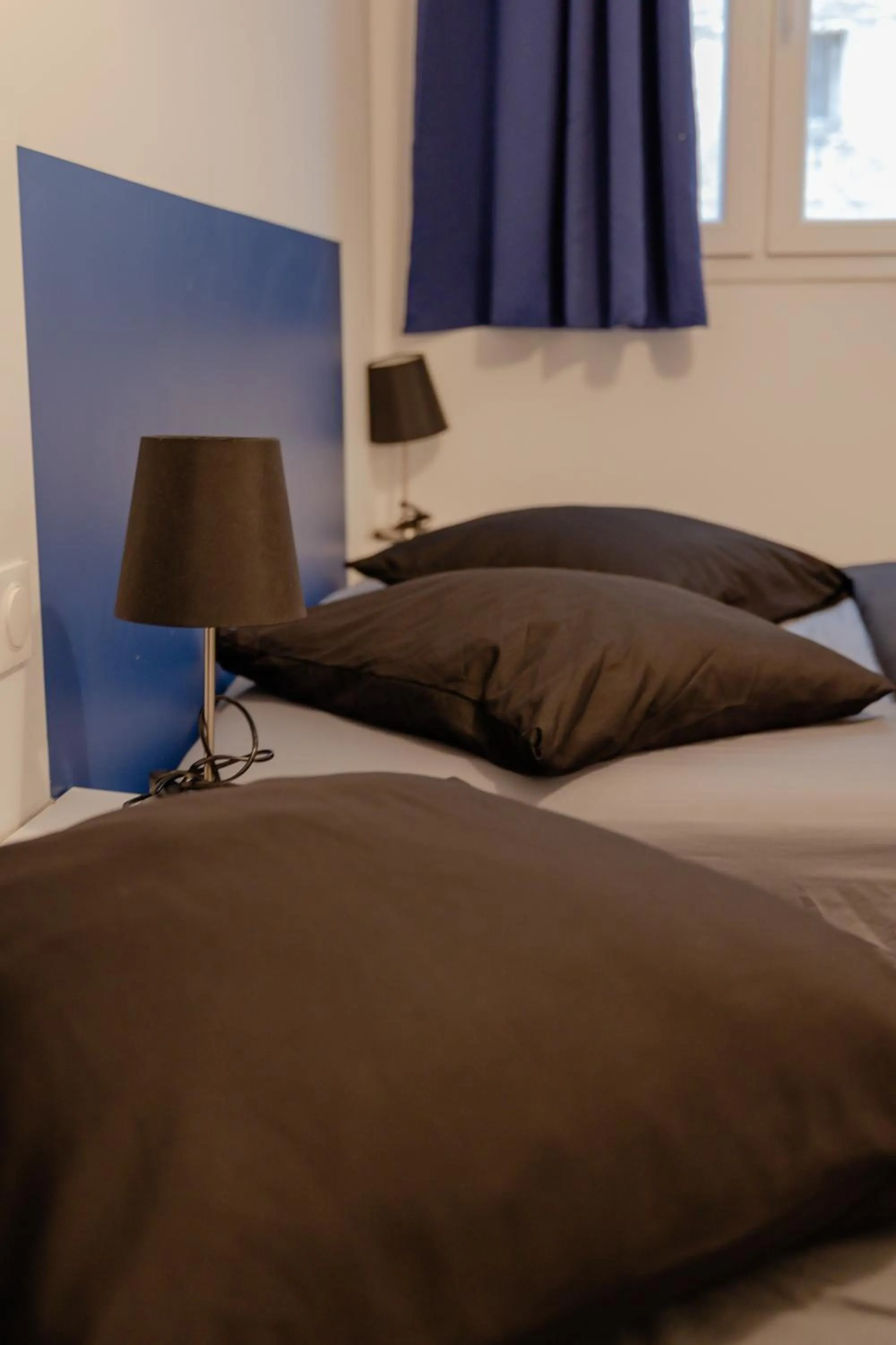 Bed in Meublés de Tourisme à Vincennes