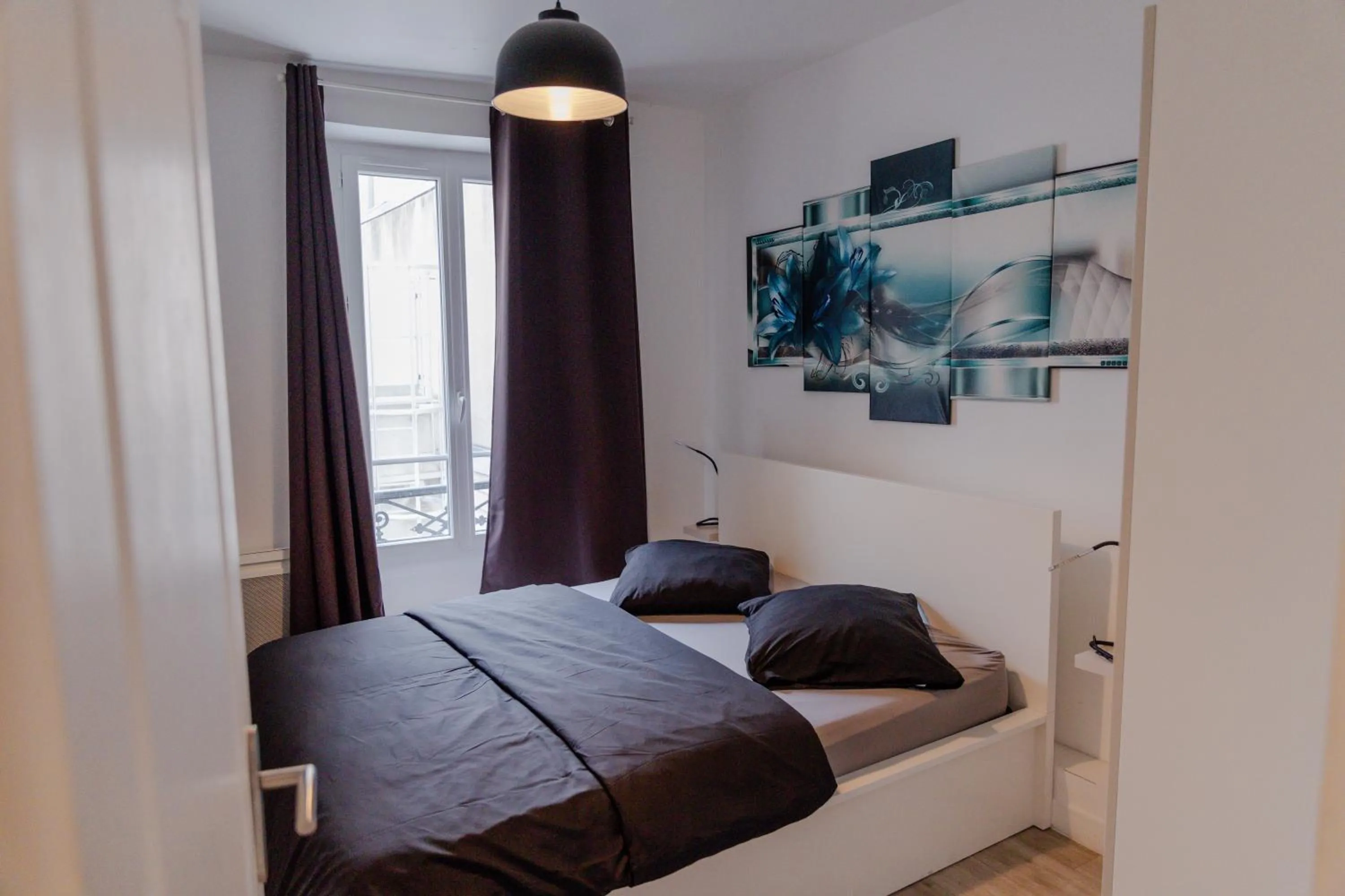 Bed in Meublés de Tourisme à Vincennes