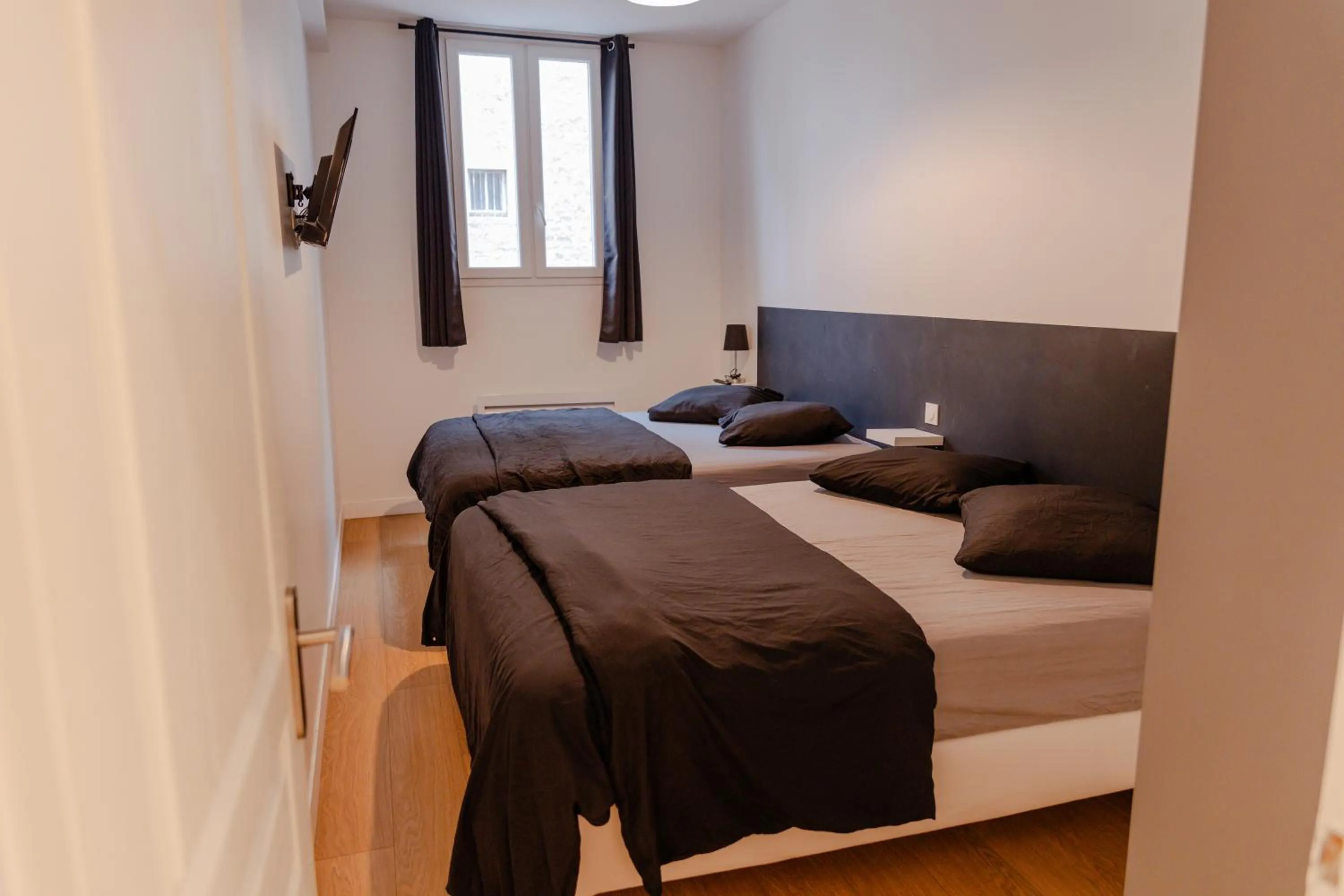 Bed in Meublés de Tourisme à Vincennes