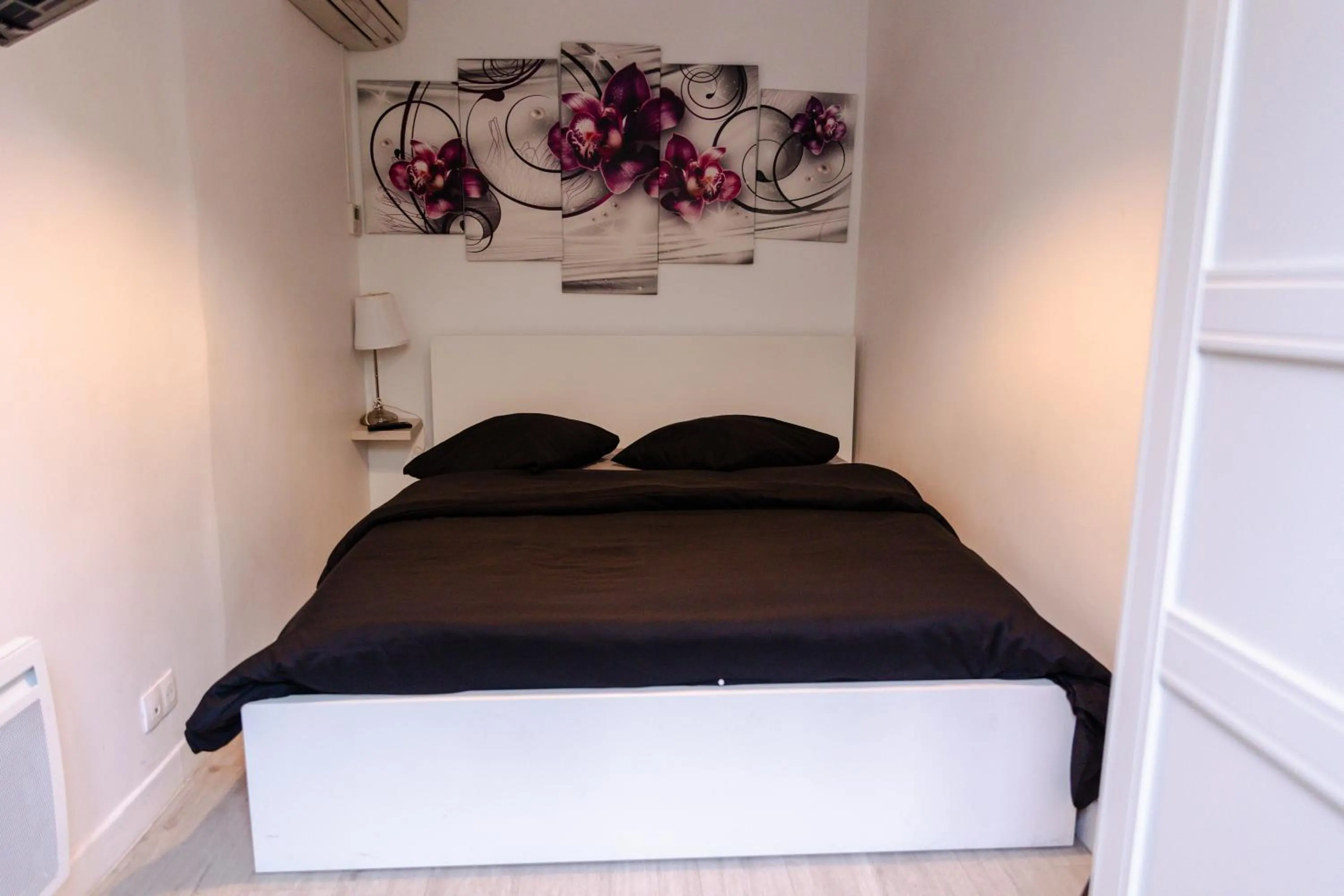 Bed in Meublés de Tourisme à Vincennes