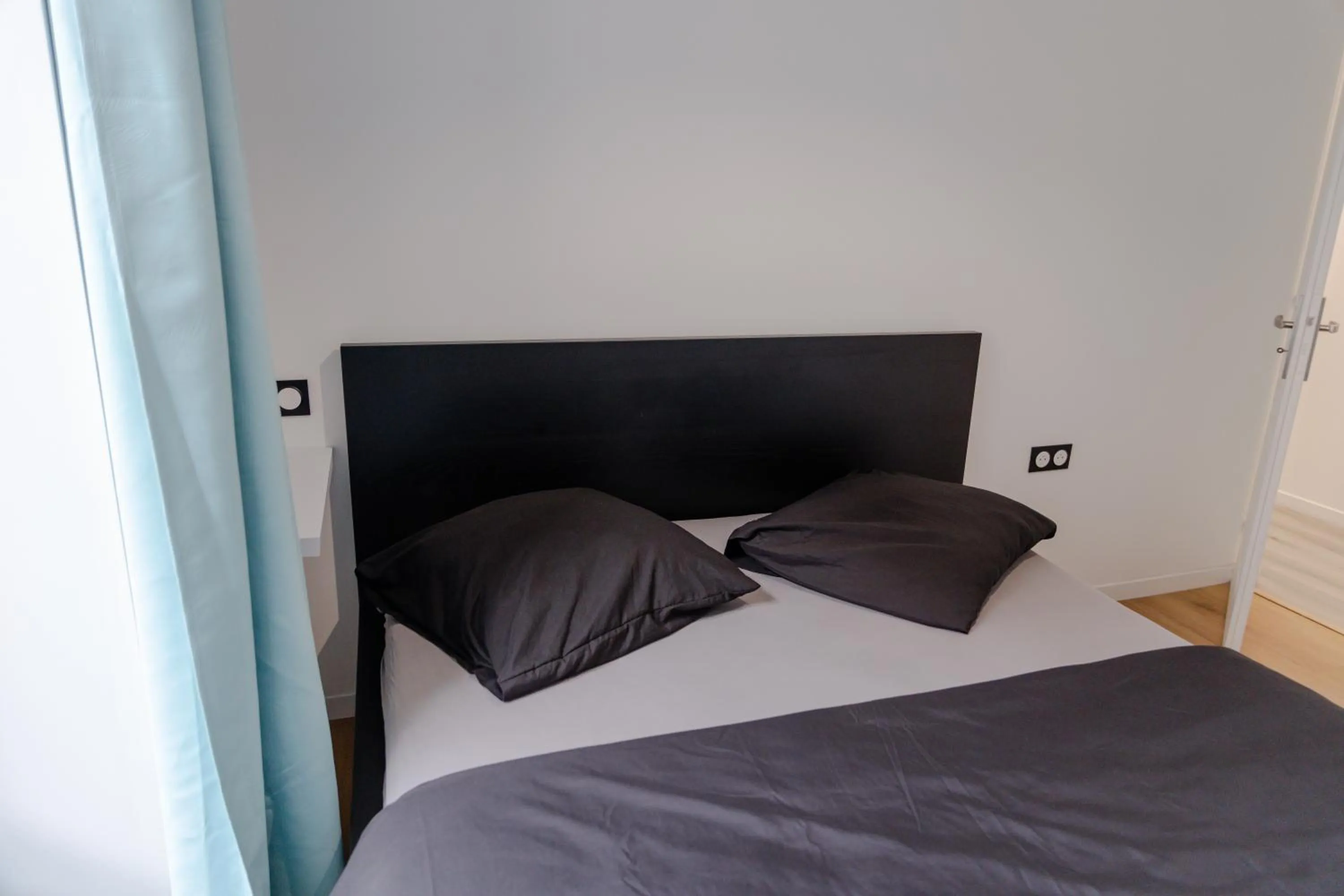 Bed in Meublés de Tourisme à Vincennes