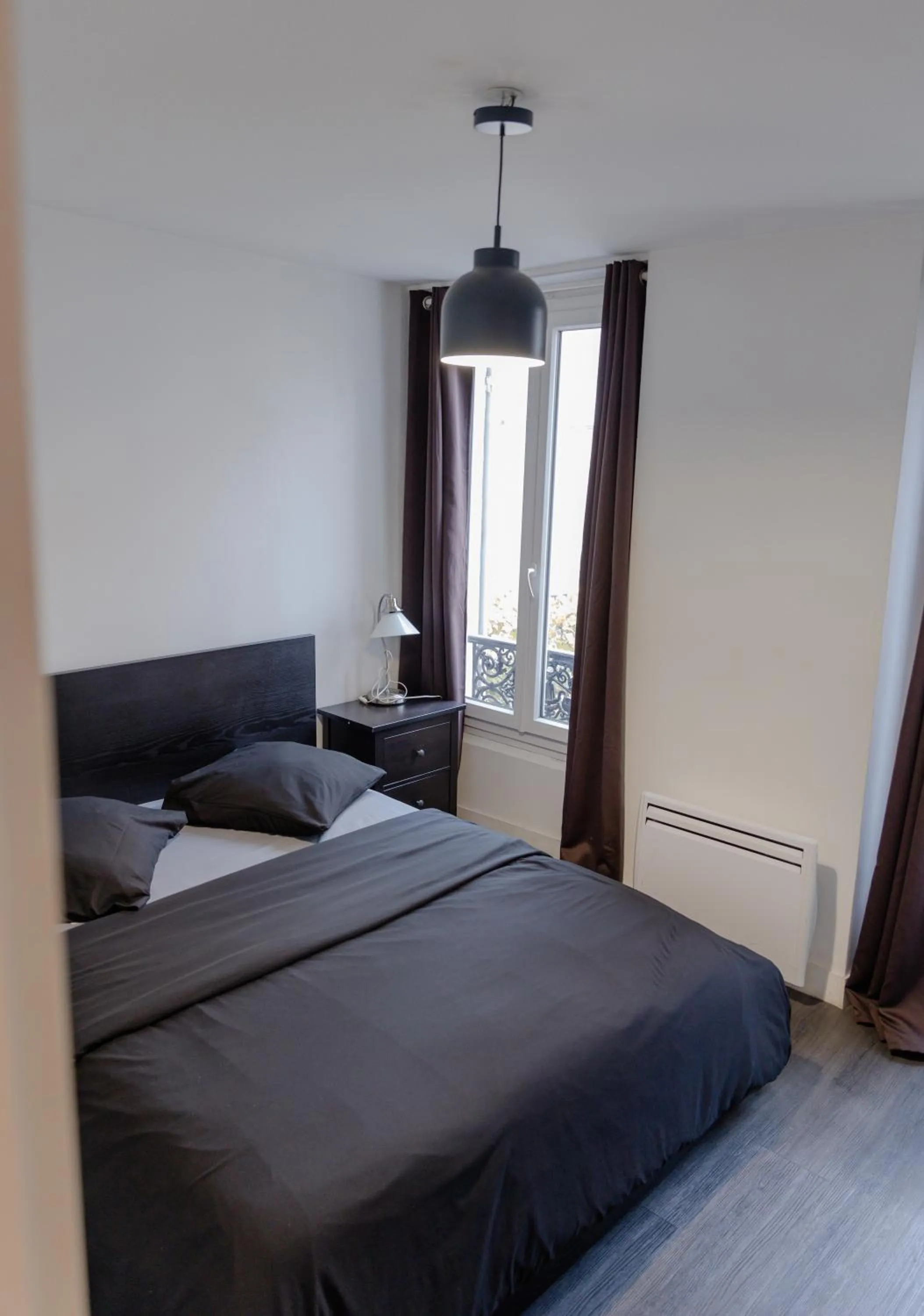 Bed in Meublés de Tourisme à Vincennes