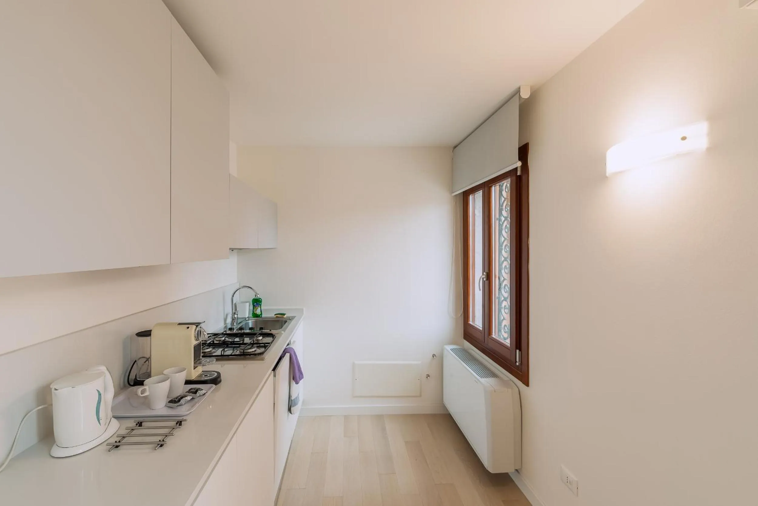 Kitchen or kitchenette in Charming Palace Corte del Teatro