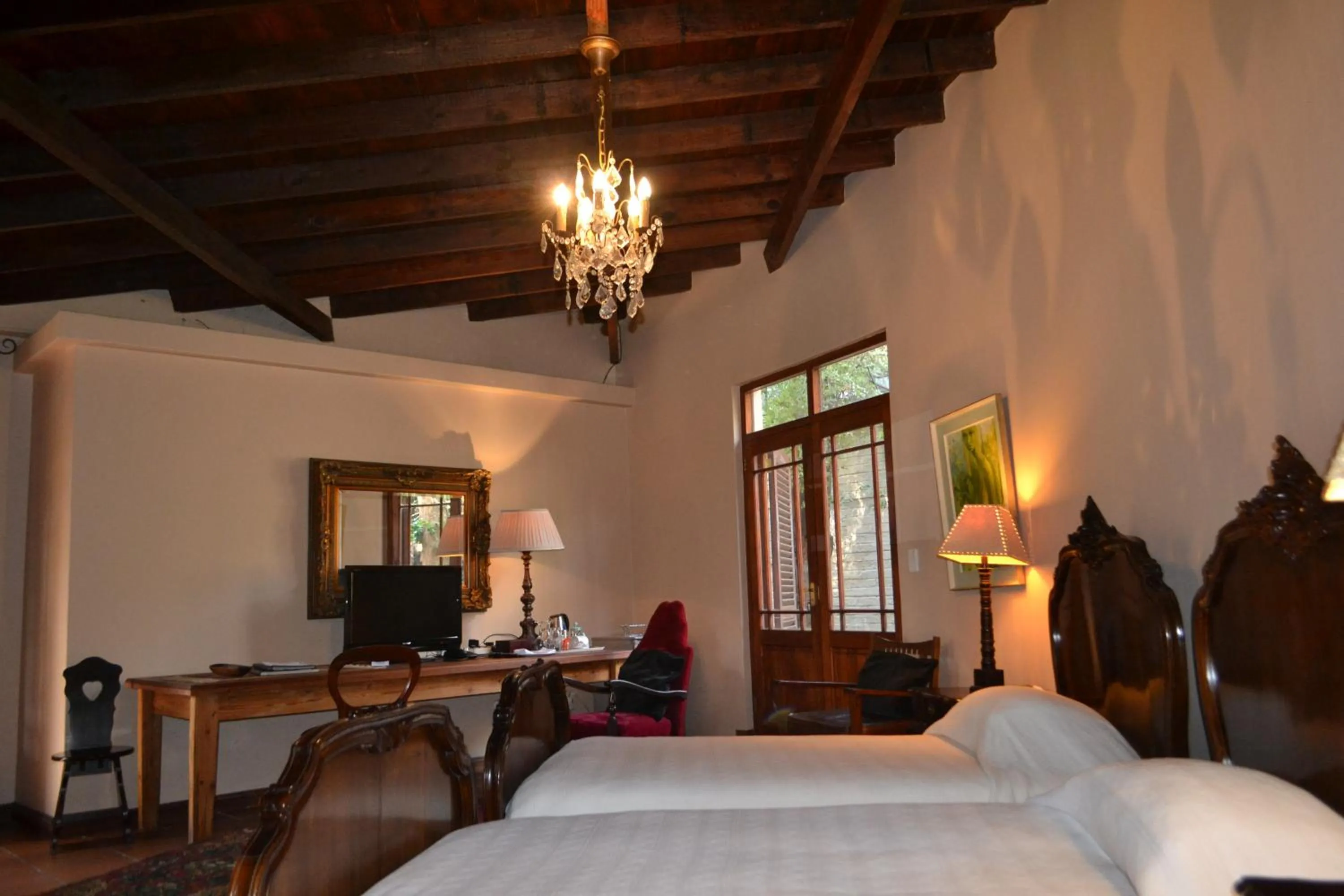 Seating area, Bed in Foxwood House Boutique Hotel