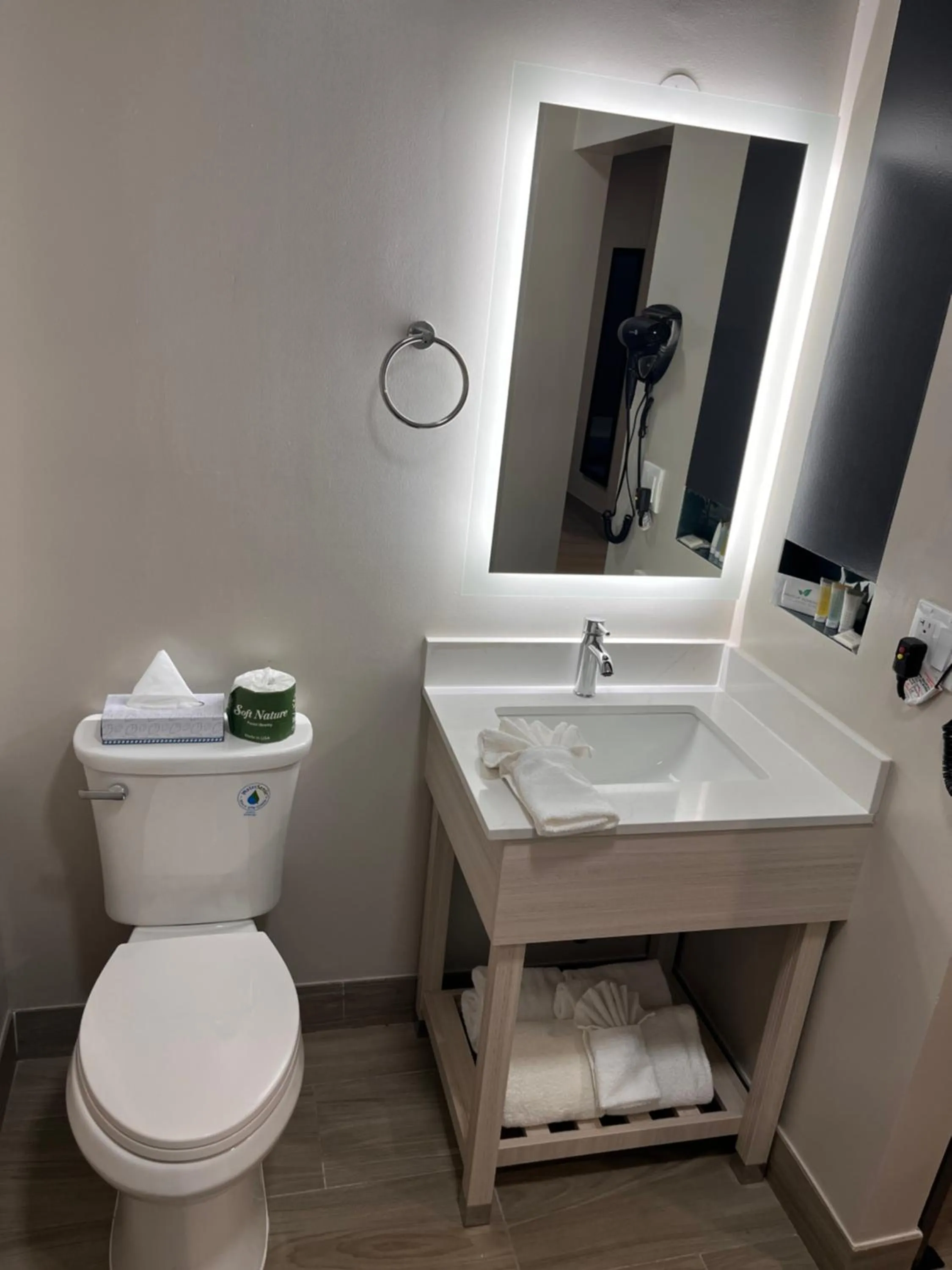 Toilet in Howard Johnson by Wyndham Flagstaff University West