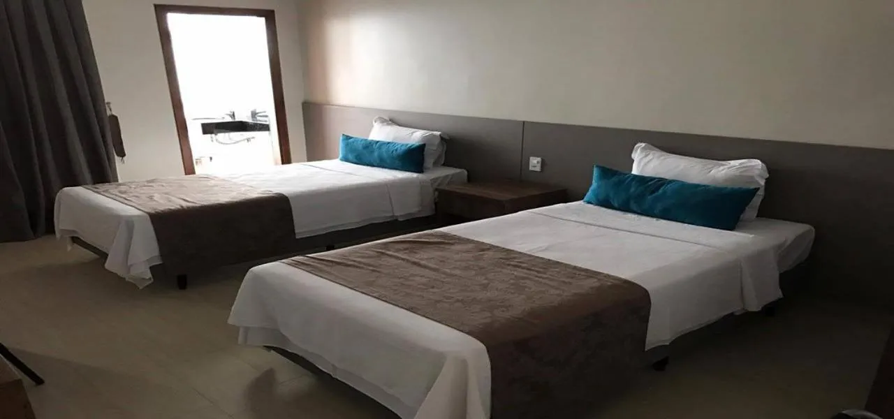 Bedroom, Bed in Racini Suites Hotel