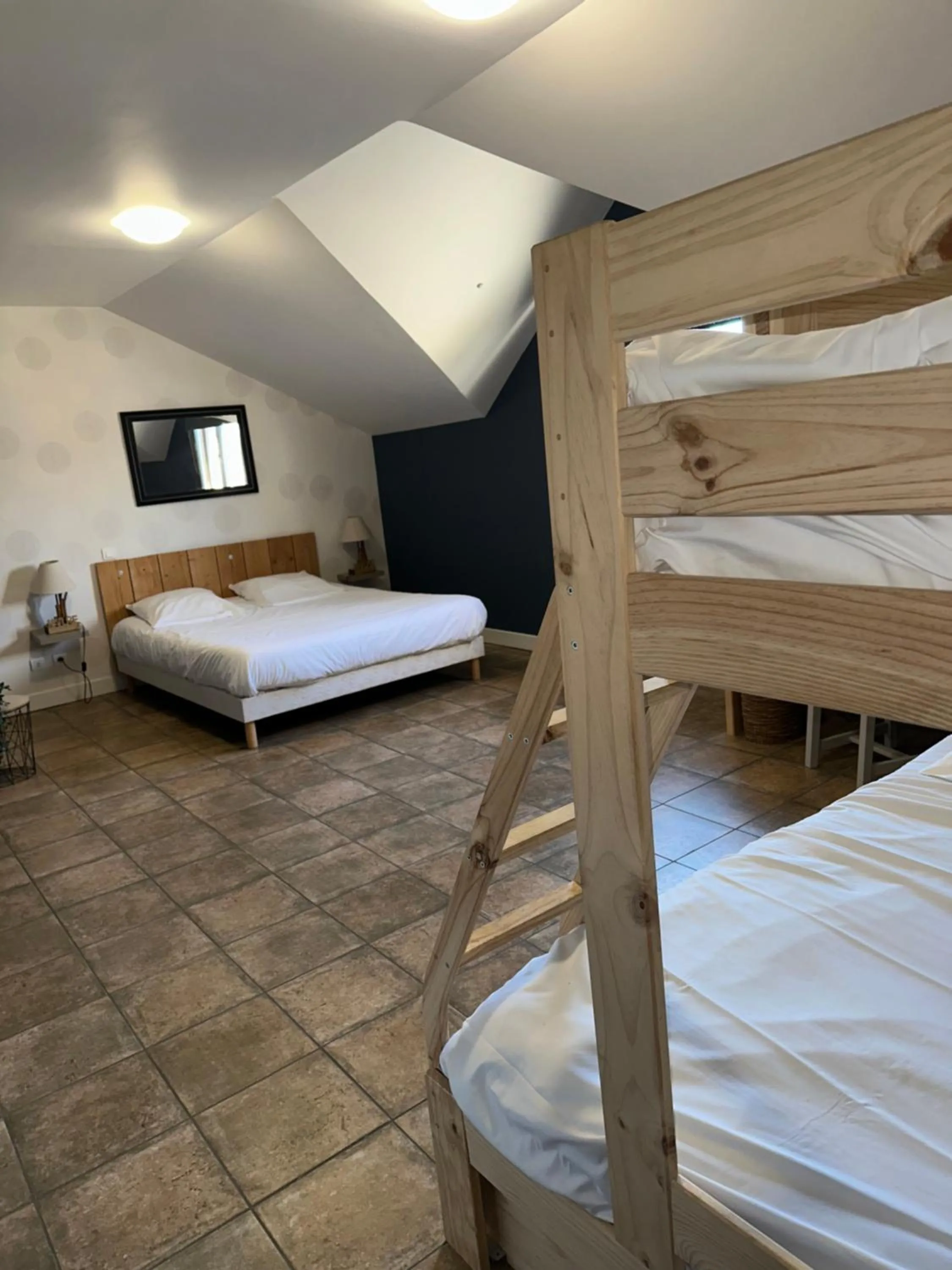 Bed in Logis Hôtel Volcan Sancy