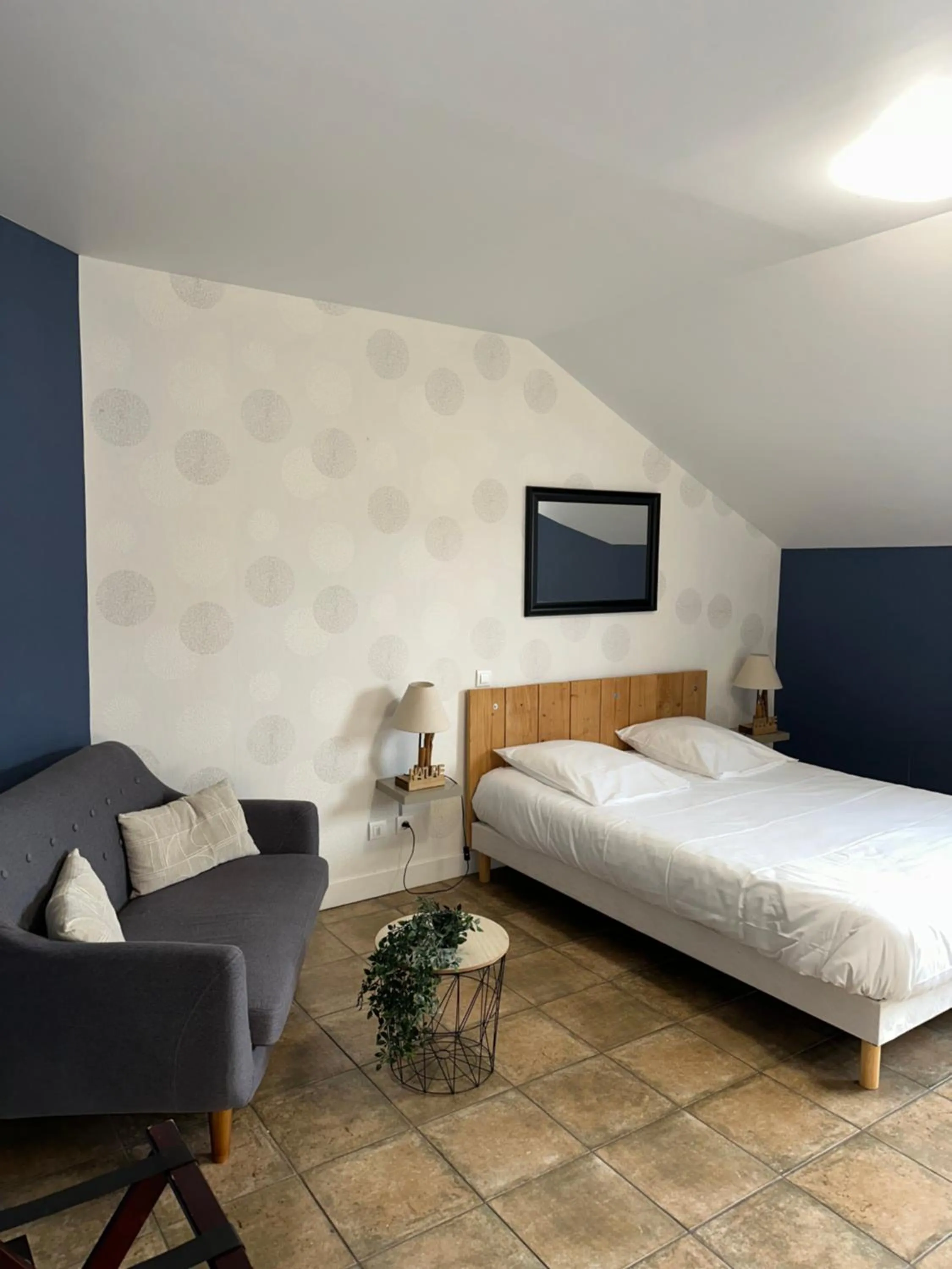 Bed in Logis Hôtel Volcan Sancy