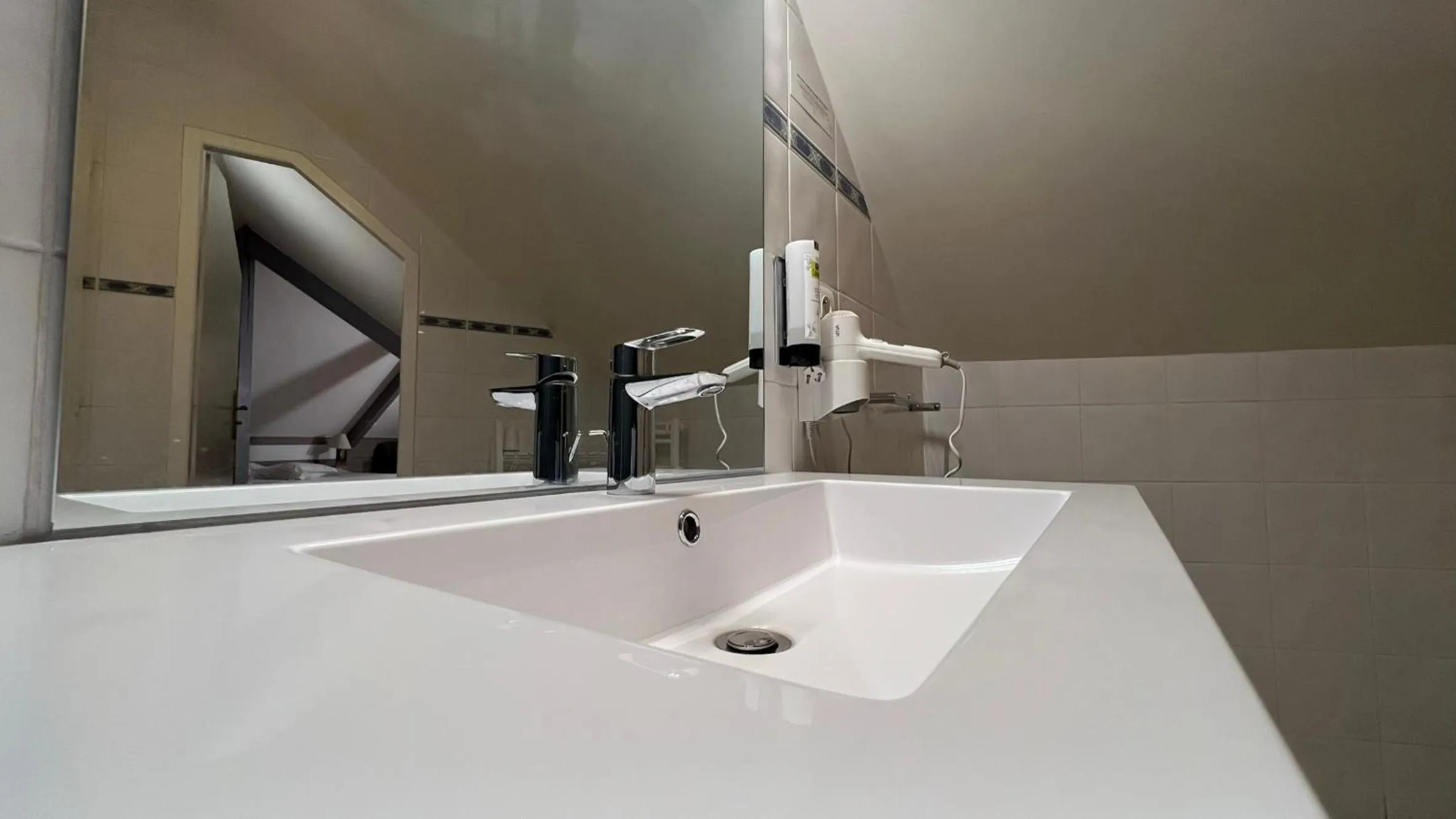 Bathroom in Logis Hôtel Volcan Sancy