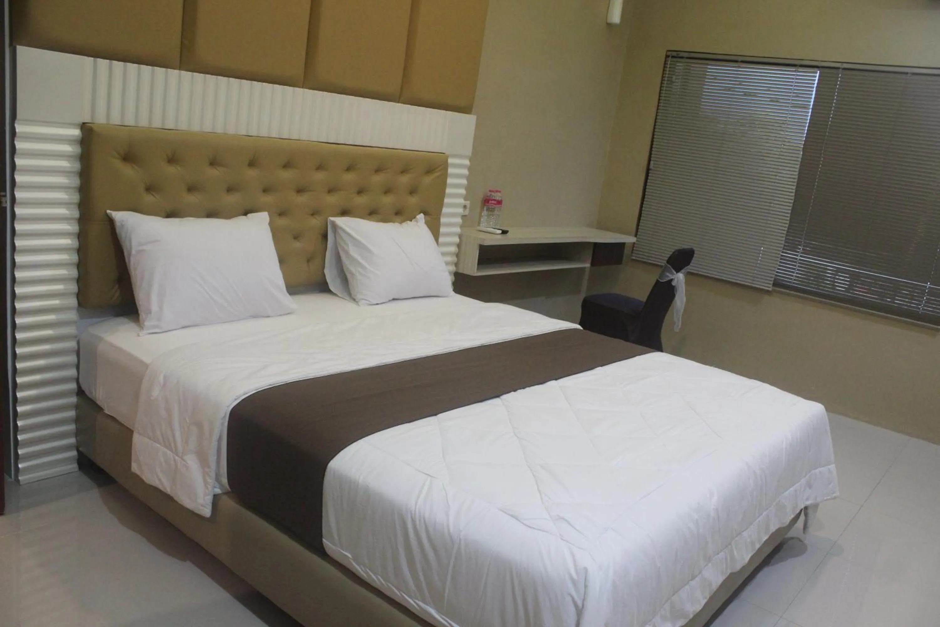 Bed in Cyka Raya Hotel