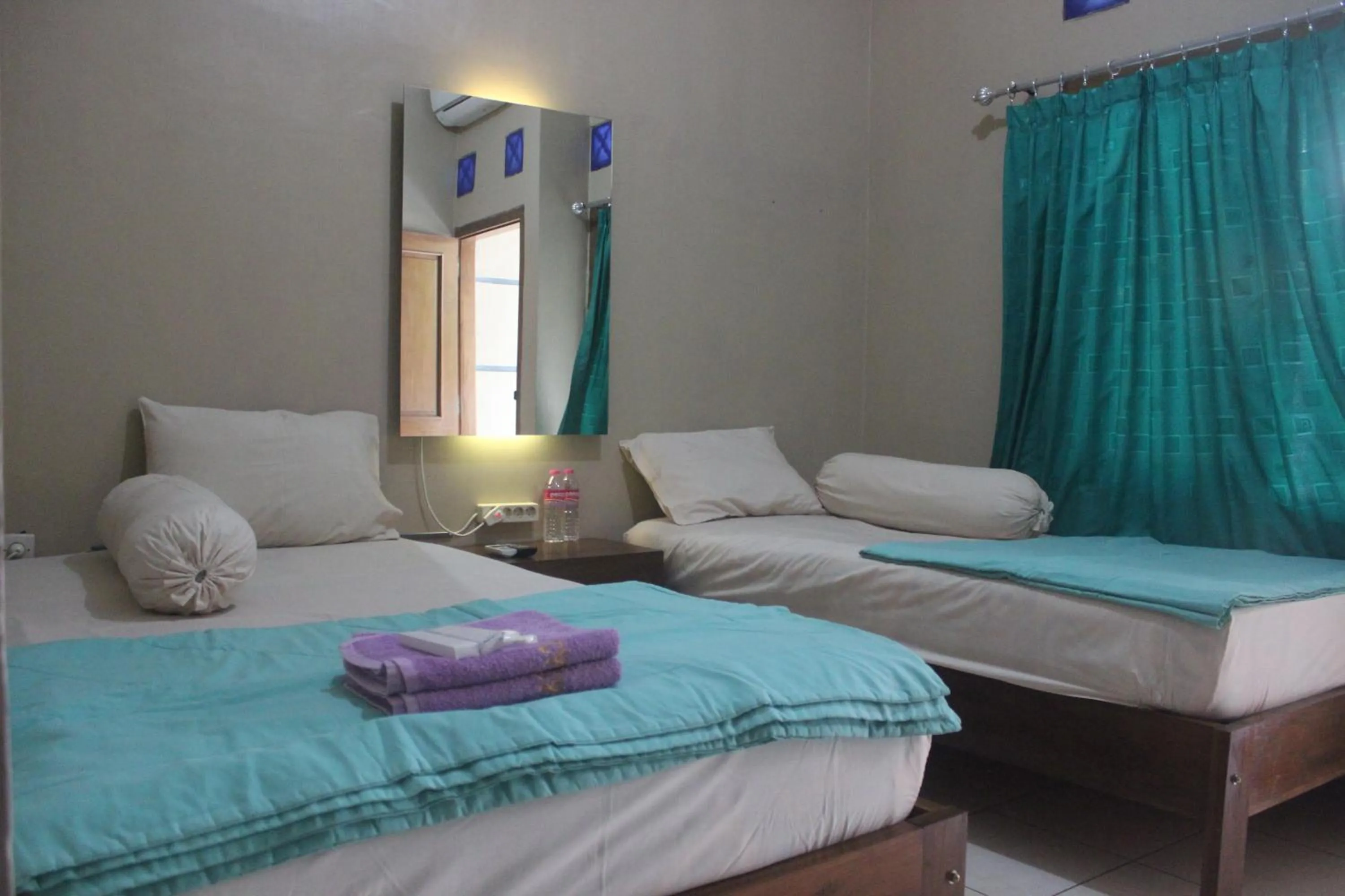 Bed in Cyka Raya Hotel