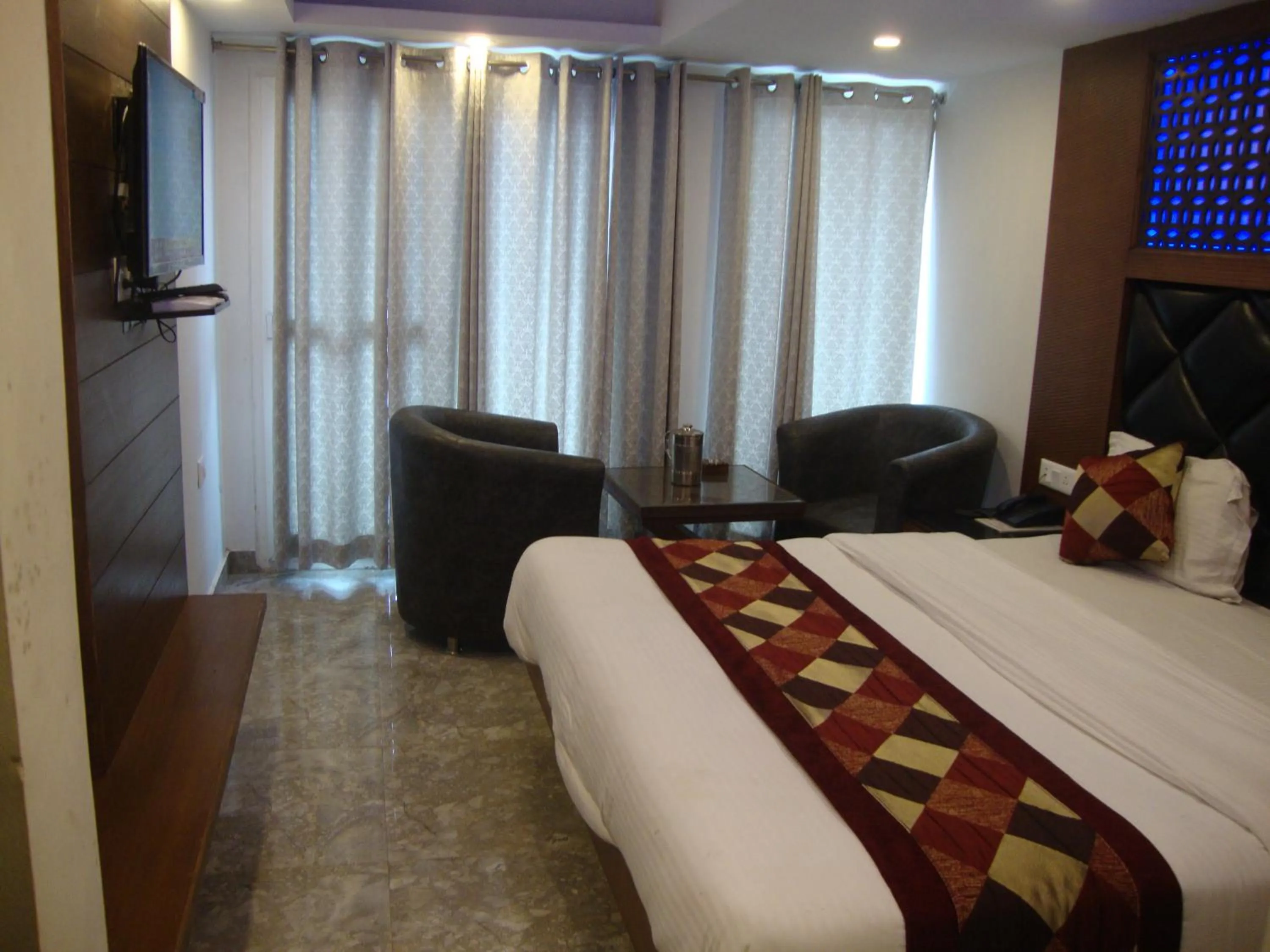 Bed in Hotel Hamers International