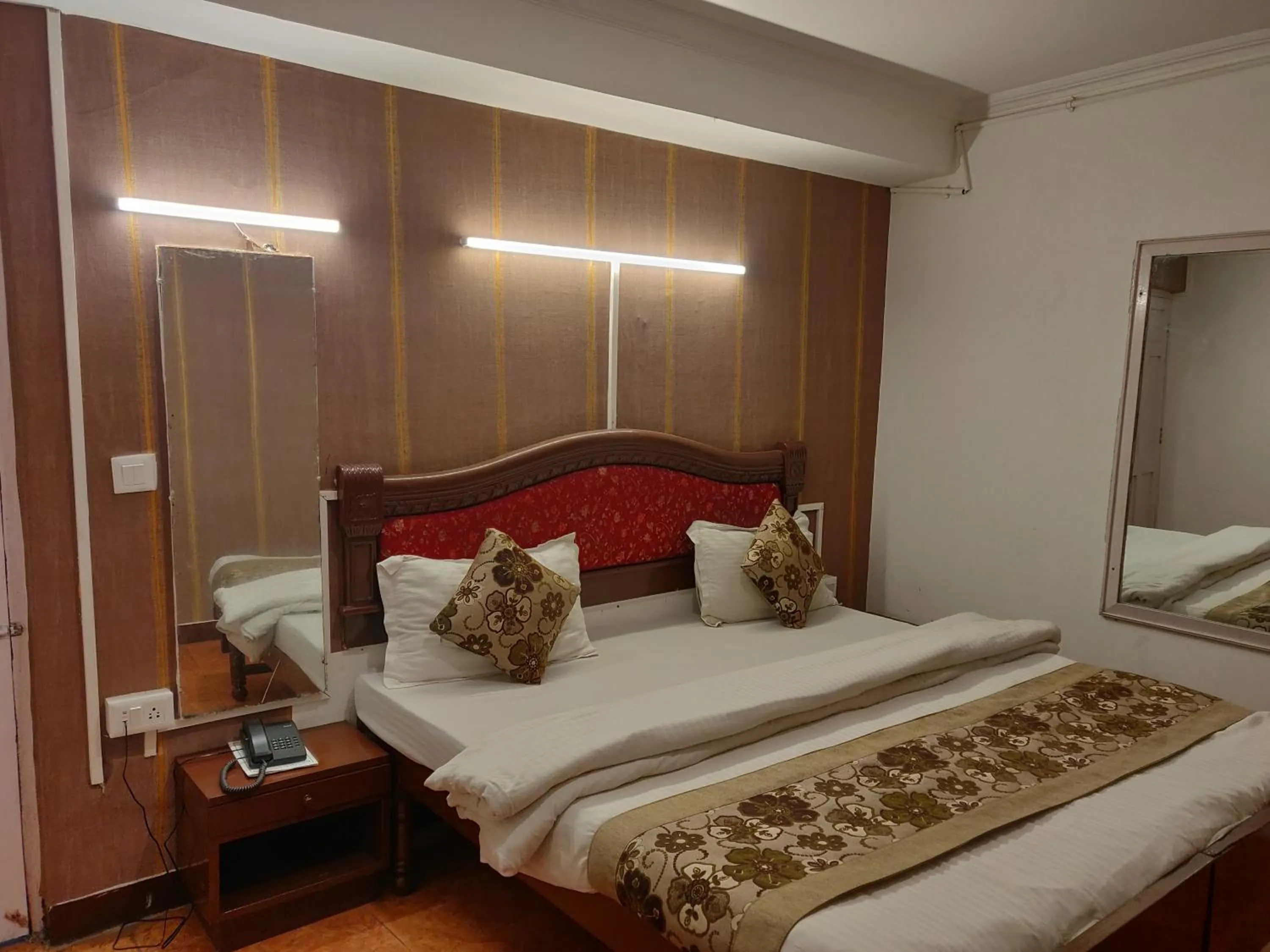 Bed in Hotel Hamers International