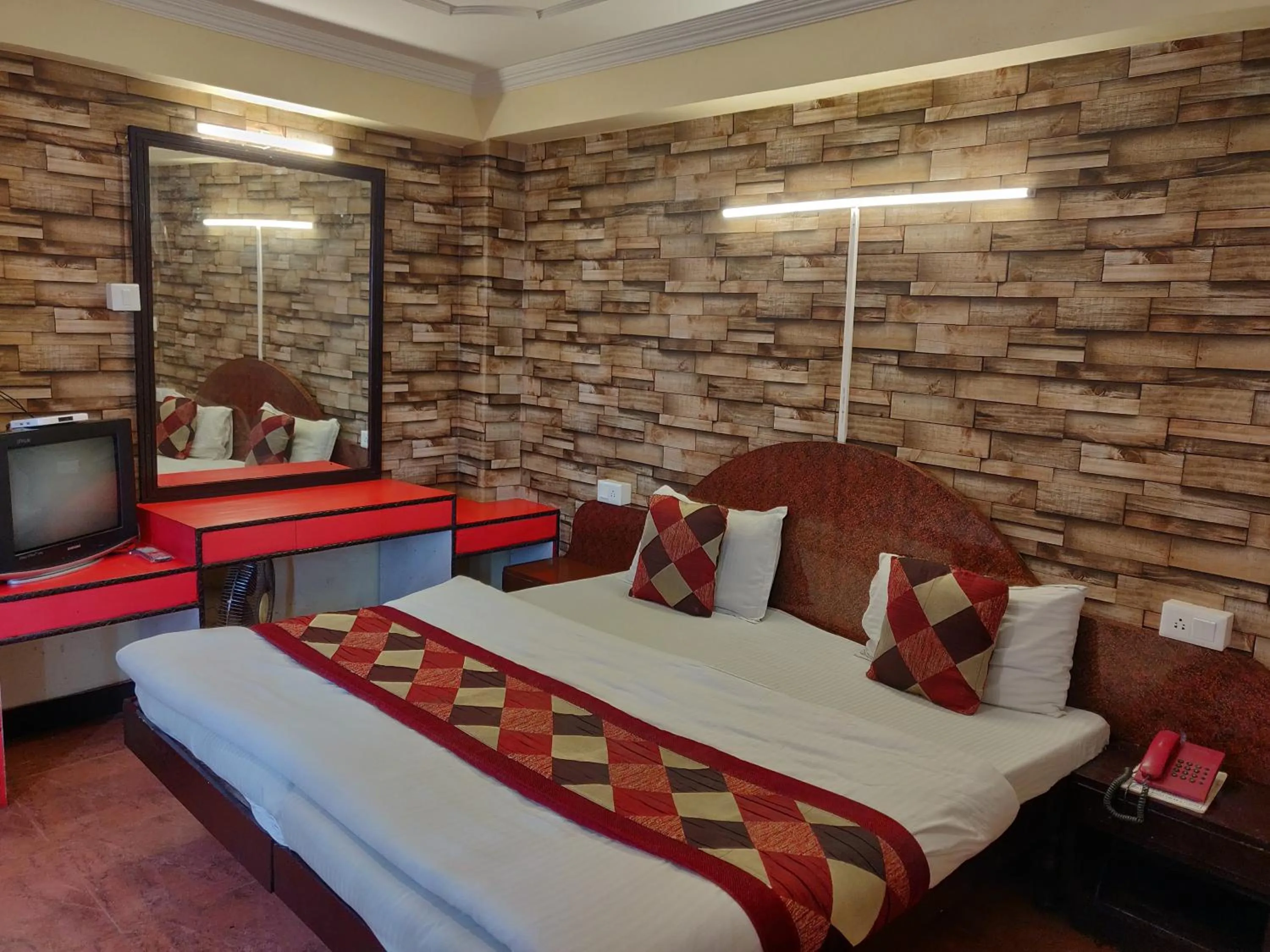 Bed in Hotel Hamers International