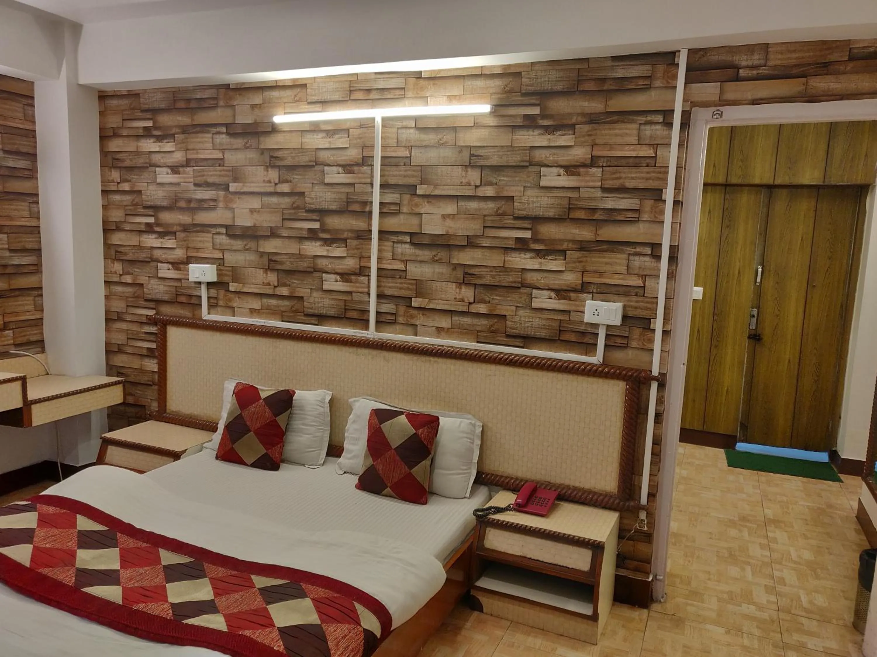 Bed in Hotel Hamers International