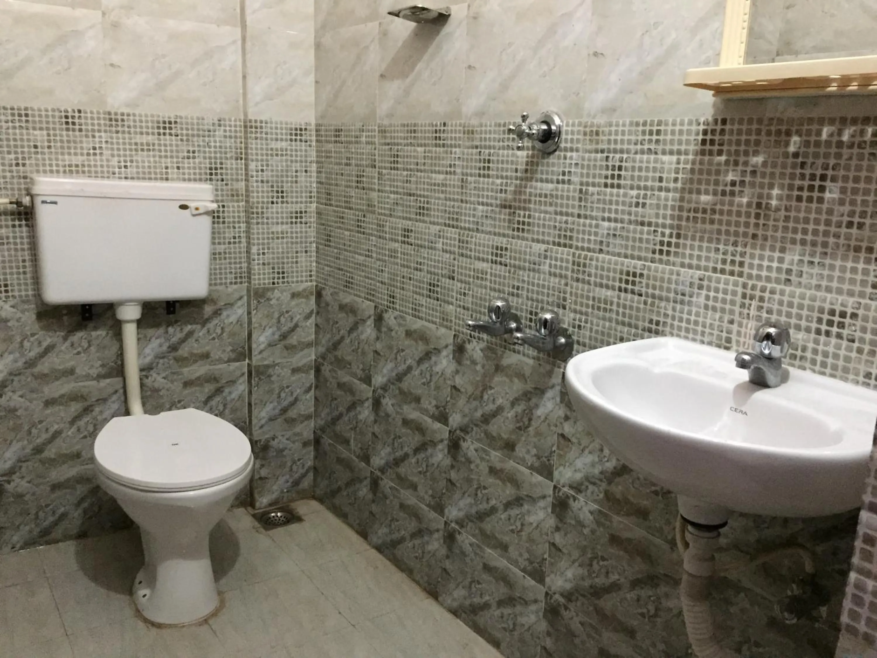 Deluxe Double Room (2 Adults + 1 Child) in Mega Tourist Home
