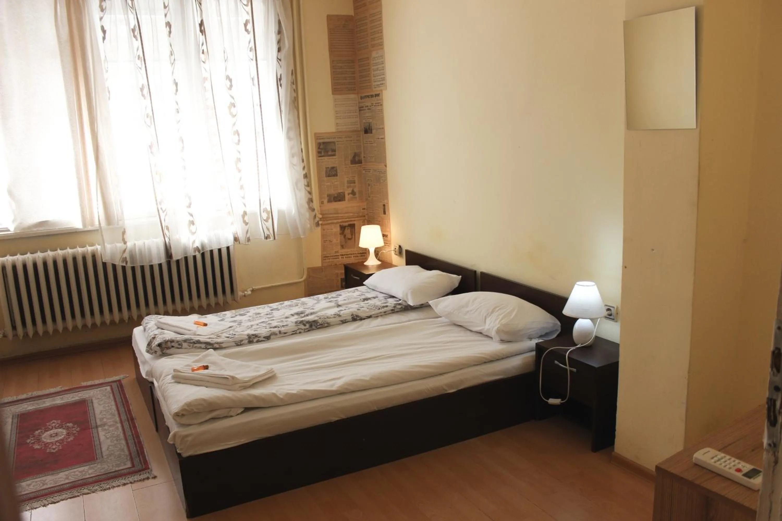 Bed in Serdika Rooms