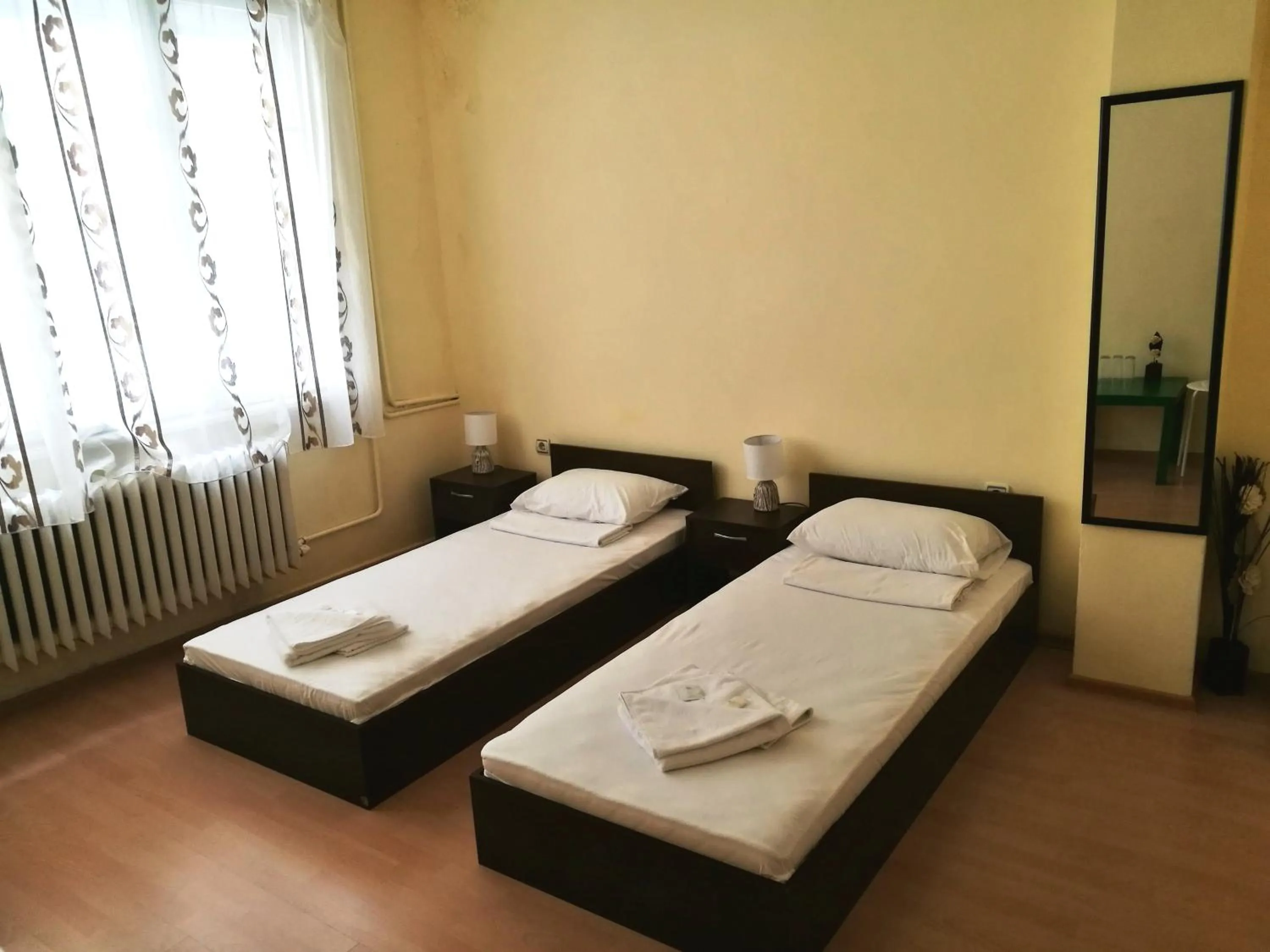 Bed in Serdika Rooms