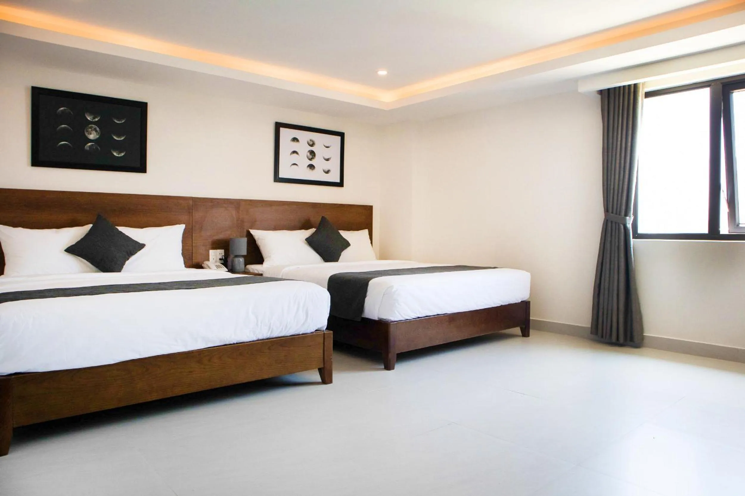 Photo of the whole room, Bed in Robin Hotel Danang