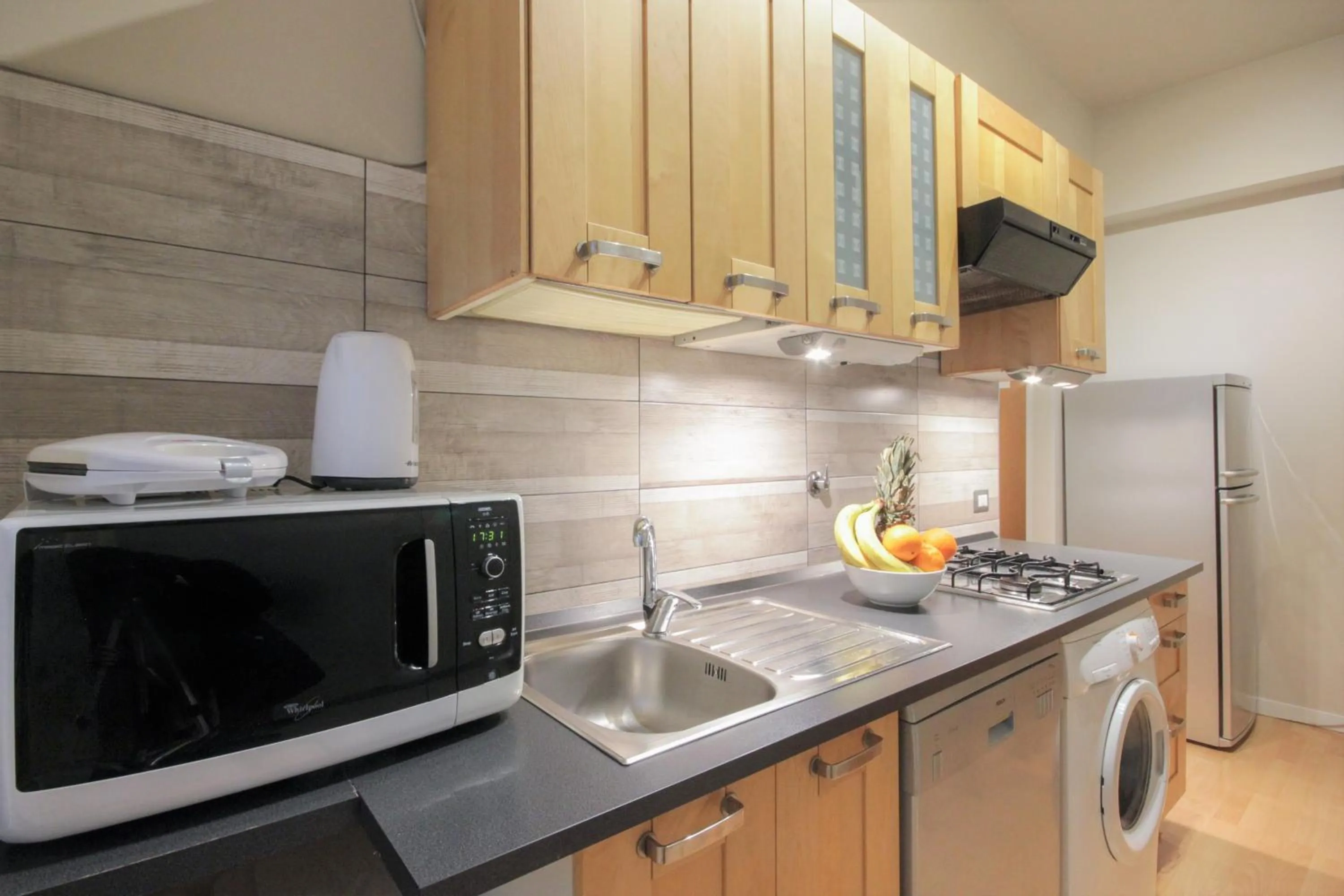 Kitchen or kitchenette in Le Piazze di Roma Sweet Apartment