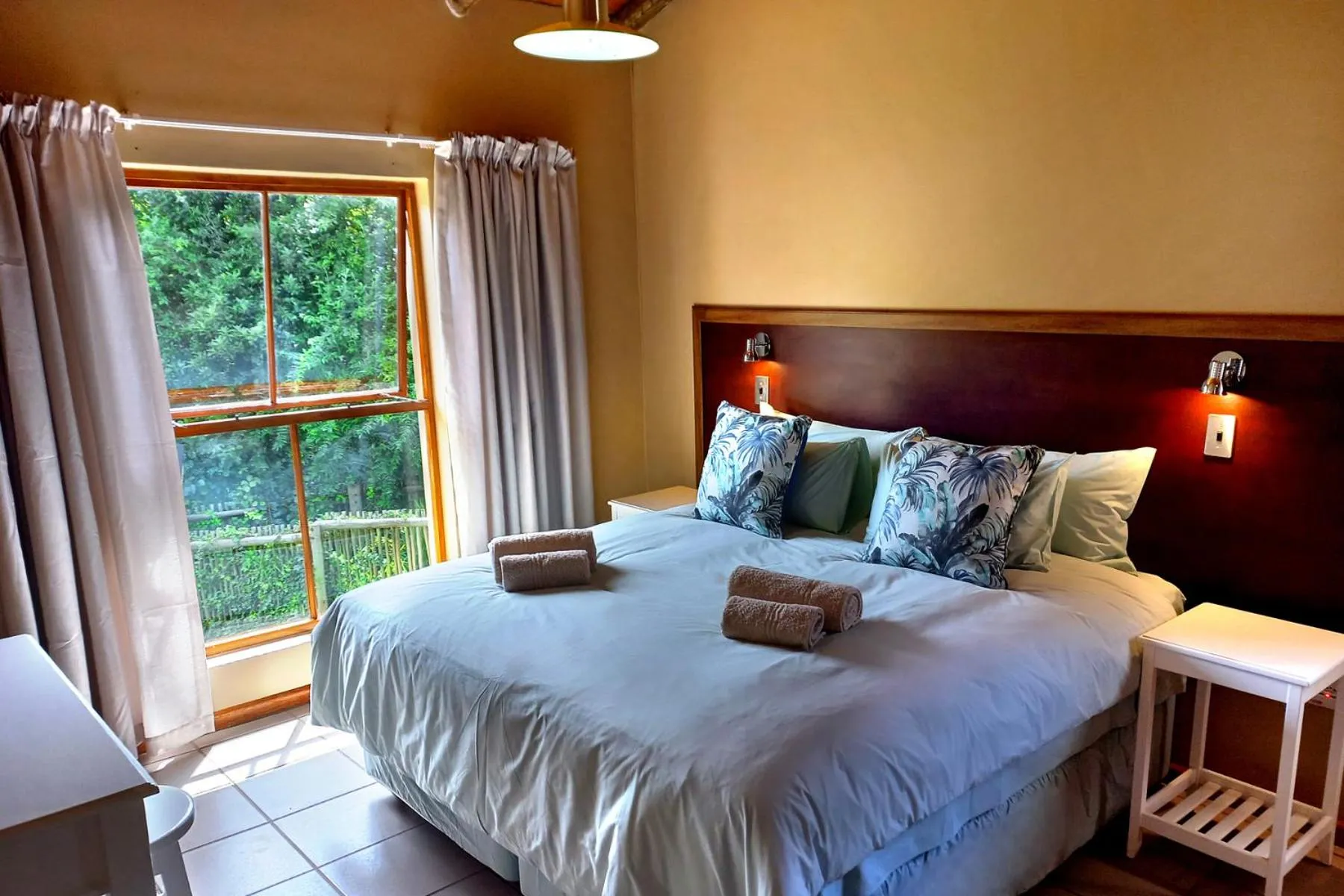 Bed in Mount Sheba Rainforest Hotel - Mountain Spring Water