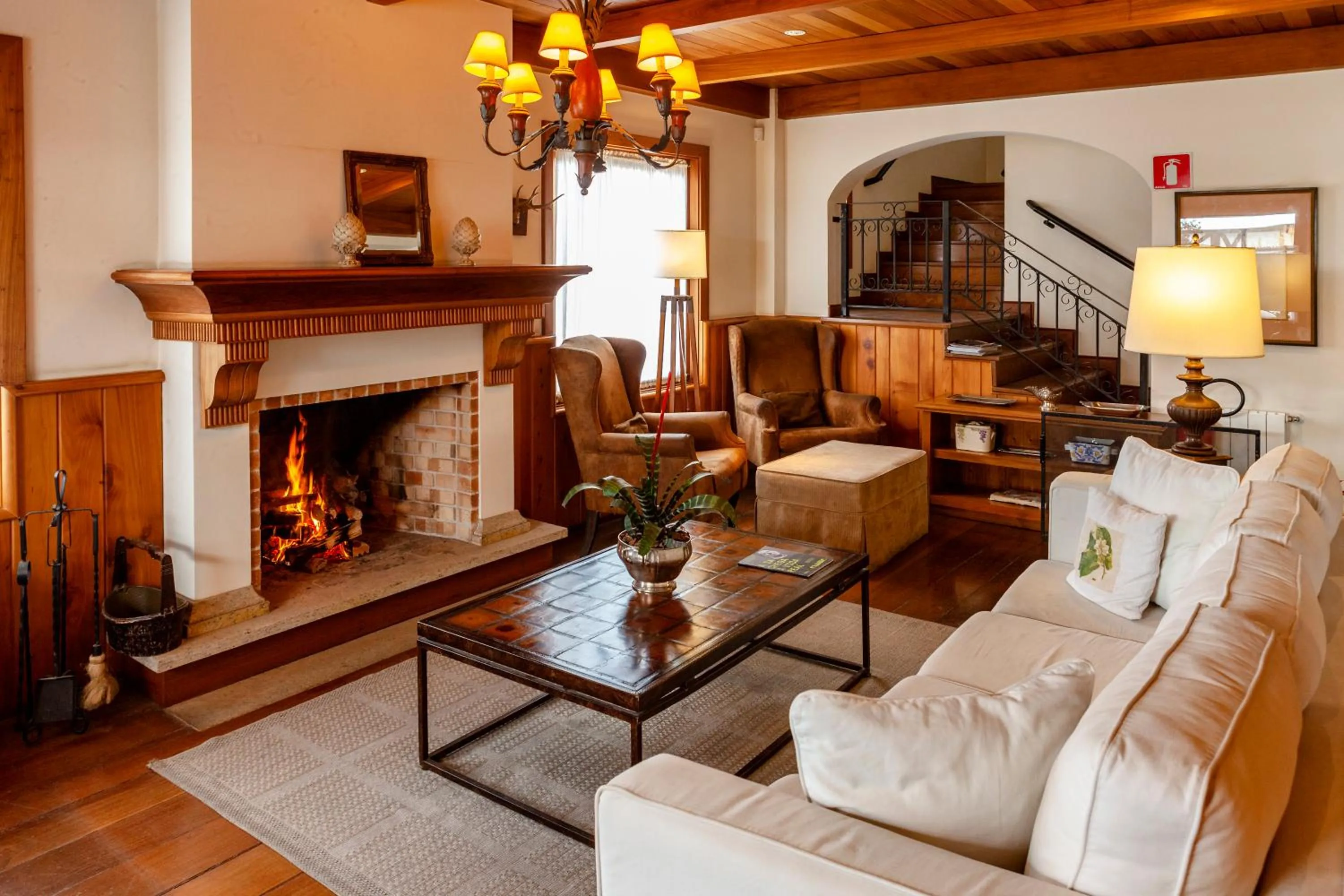 Communal lounge/ TV room in Hotel Solar d'Izabel