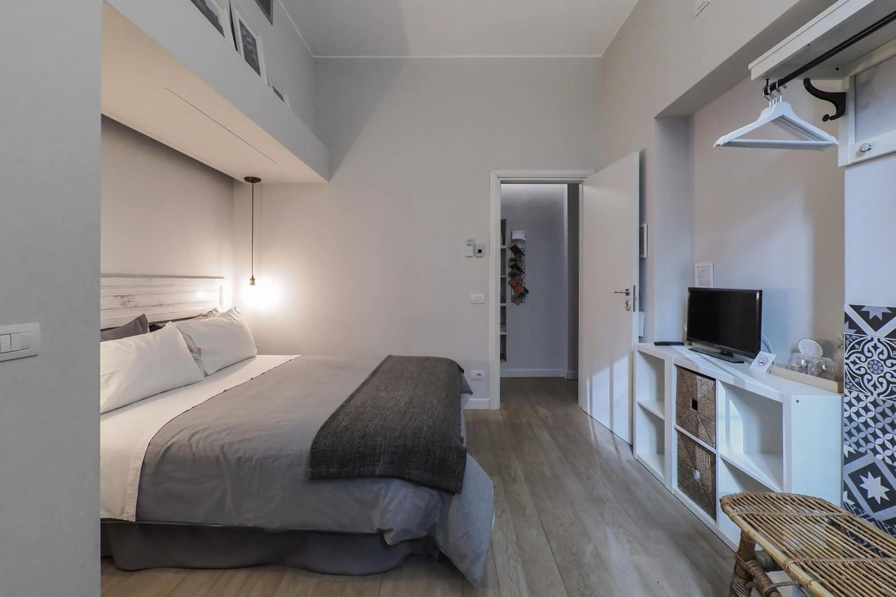 Photo of the whole room, Bed in Tiaré Home Milano