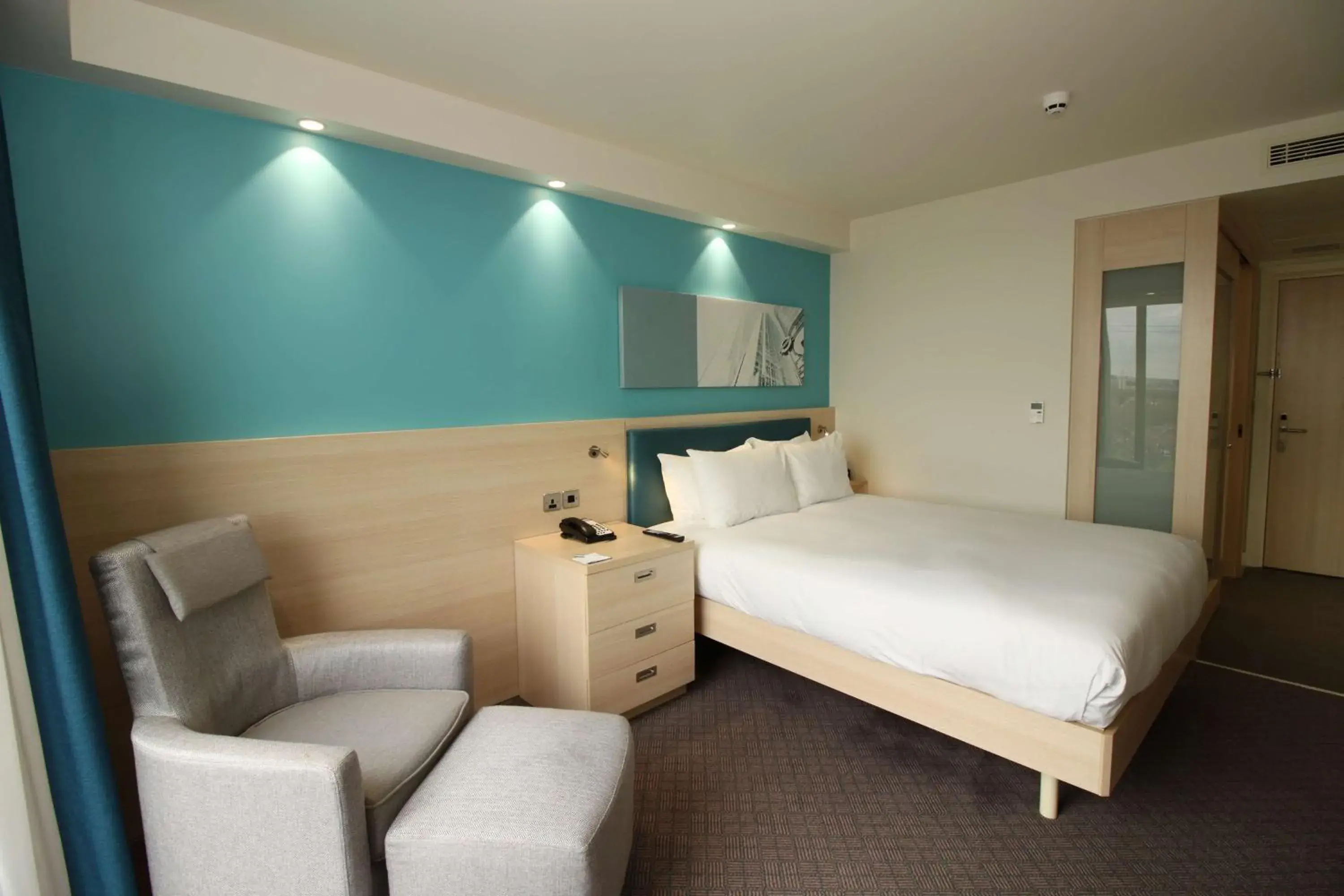 Living room, Bed in Hampton By Hilton London Docklands Living room, Bed in Hampton By Hilton London Docklands