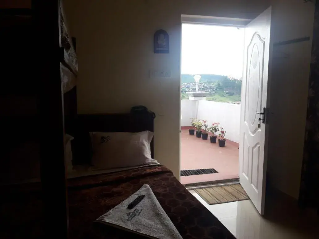 Bed in Drizzle Drop Inn Bed in Drizzle Drop Inn