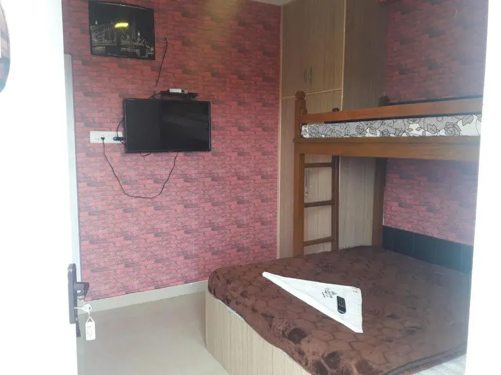 Bed in Drizzle Drop Inn Bed in Drizzle Drop Inn